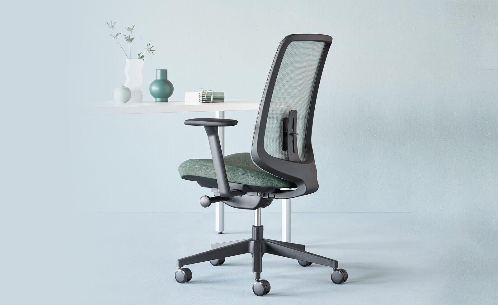 Verus chair on a white office desk setting