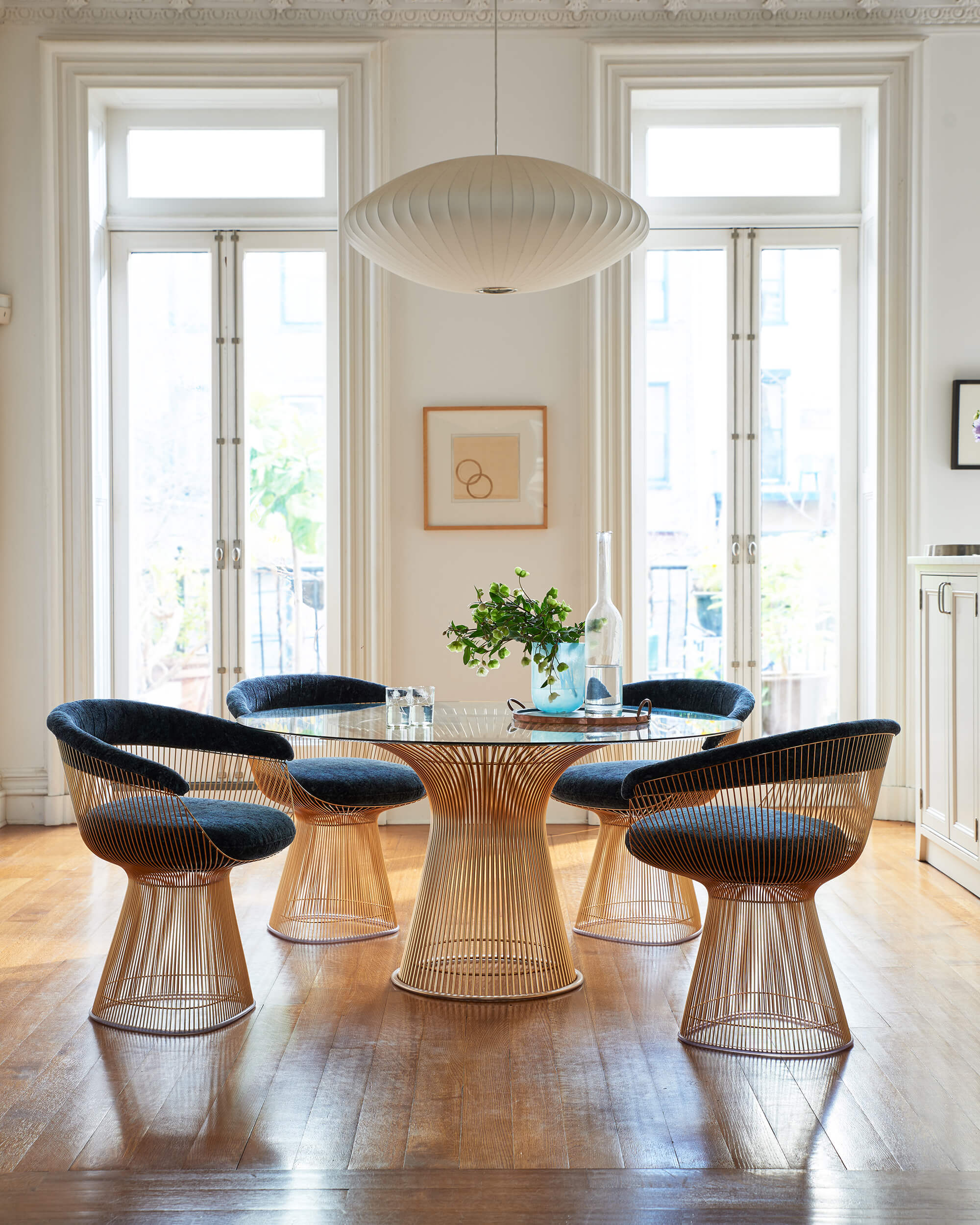 Platner Arm side chair in a dinning room