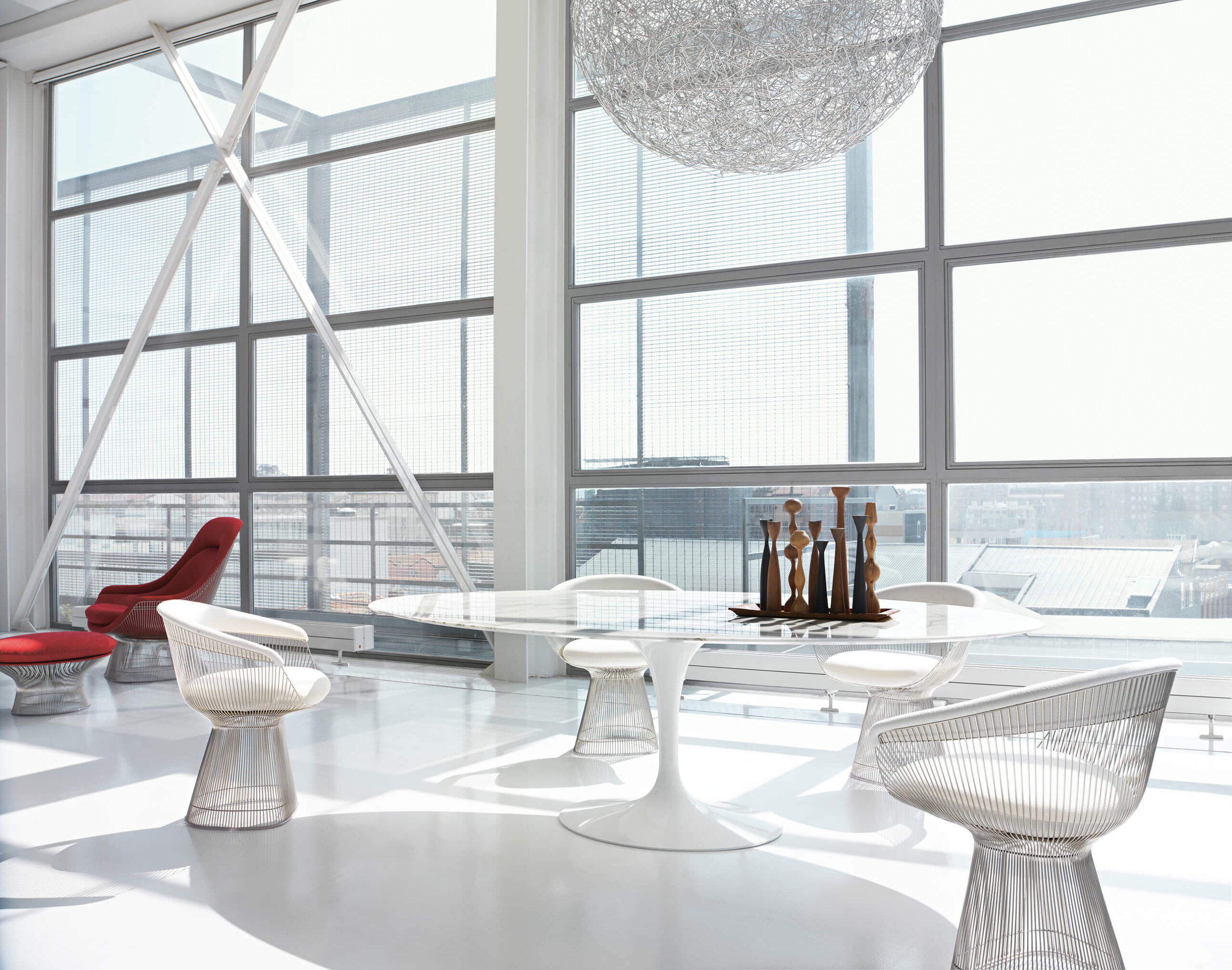 Platner Arm side chair in an airport lounge design