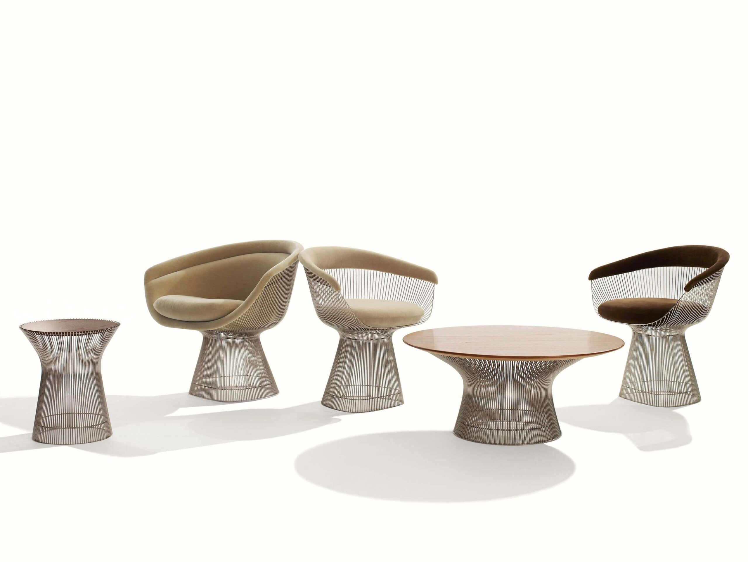 Platner Arm side chair with other chairs and tables