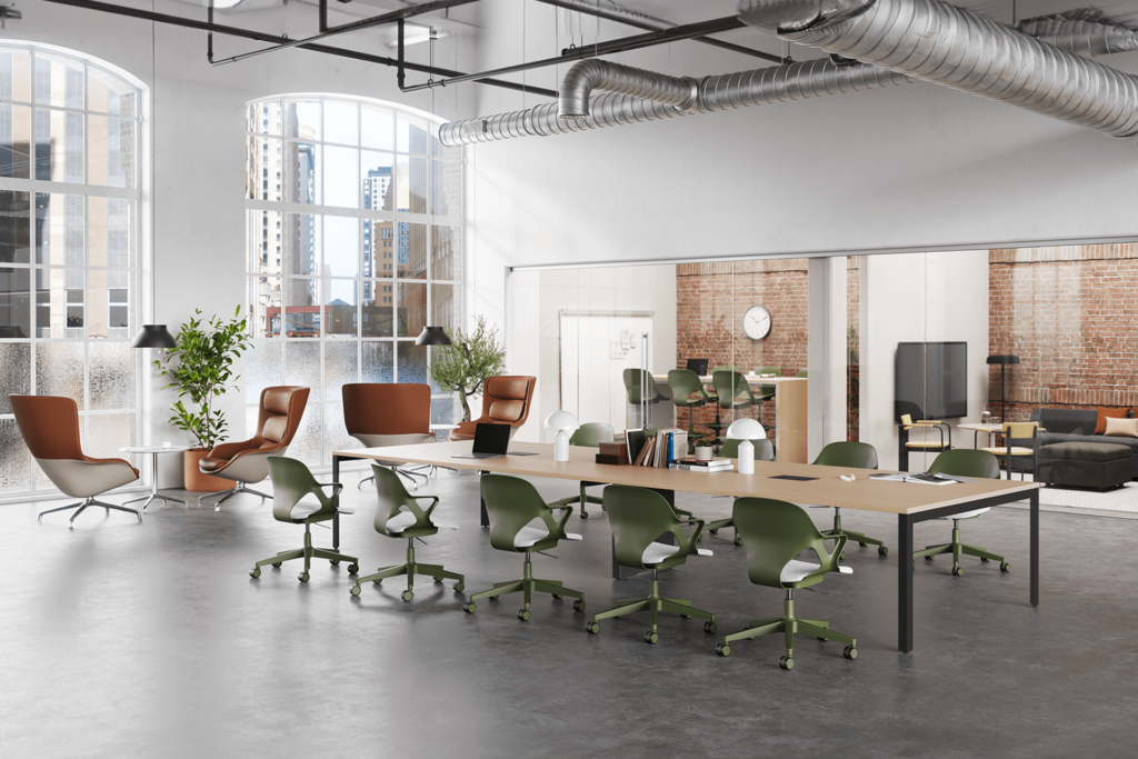 modern university campus featuring ergonomic maroon chairs and a long wooden table