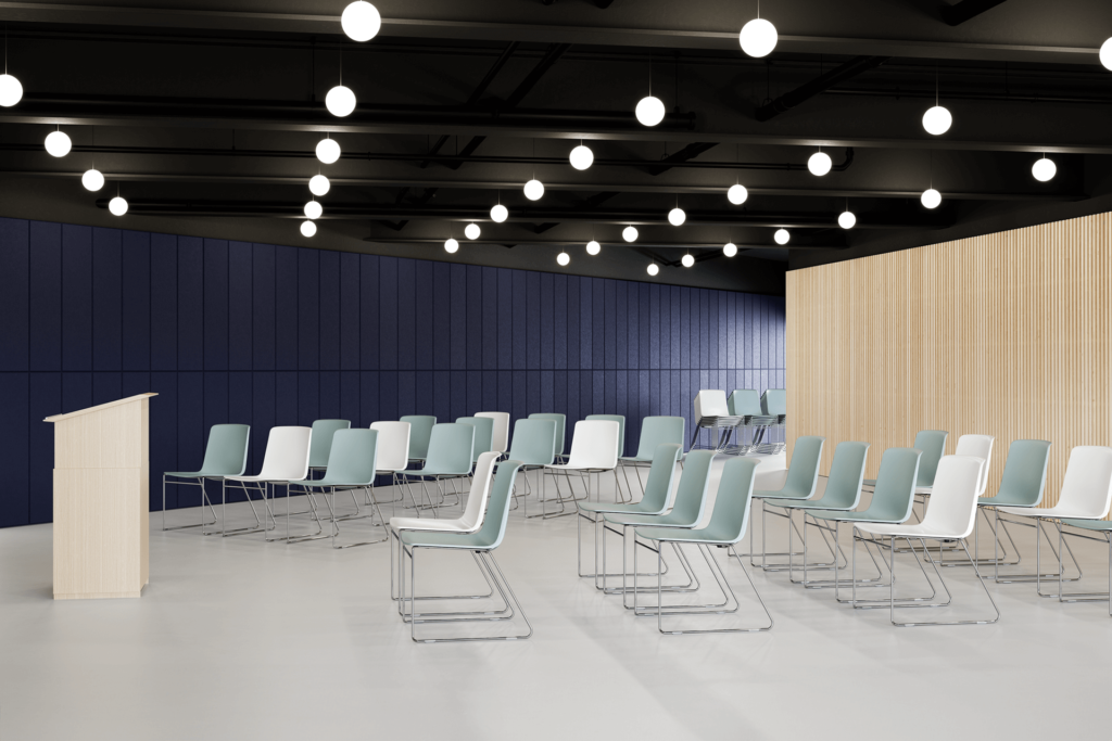 serminar room at a university featuring gray stacking chairs