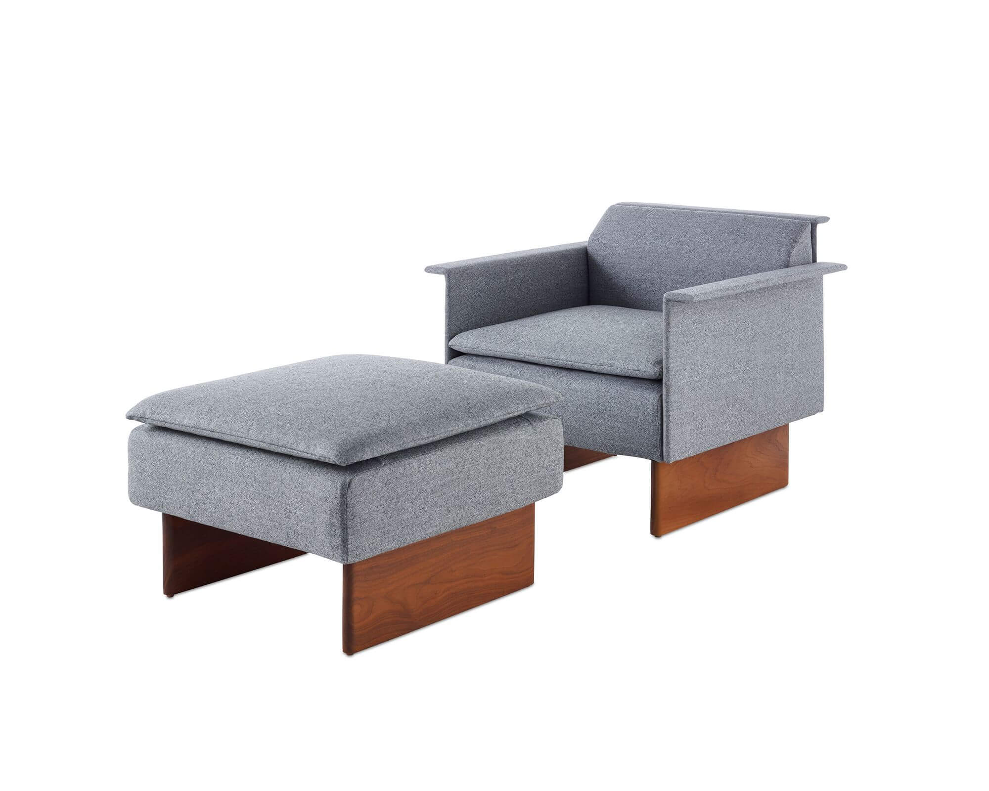 the side angle of a Mantle Club Chair and ottoman with a wooden base and light blue marle upholstery