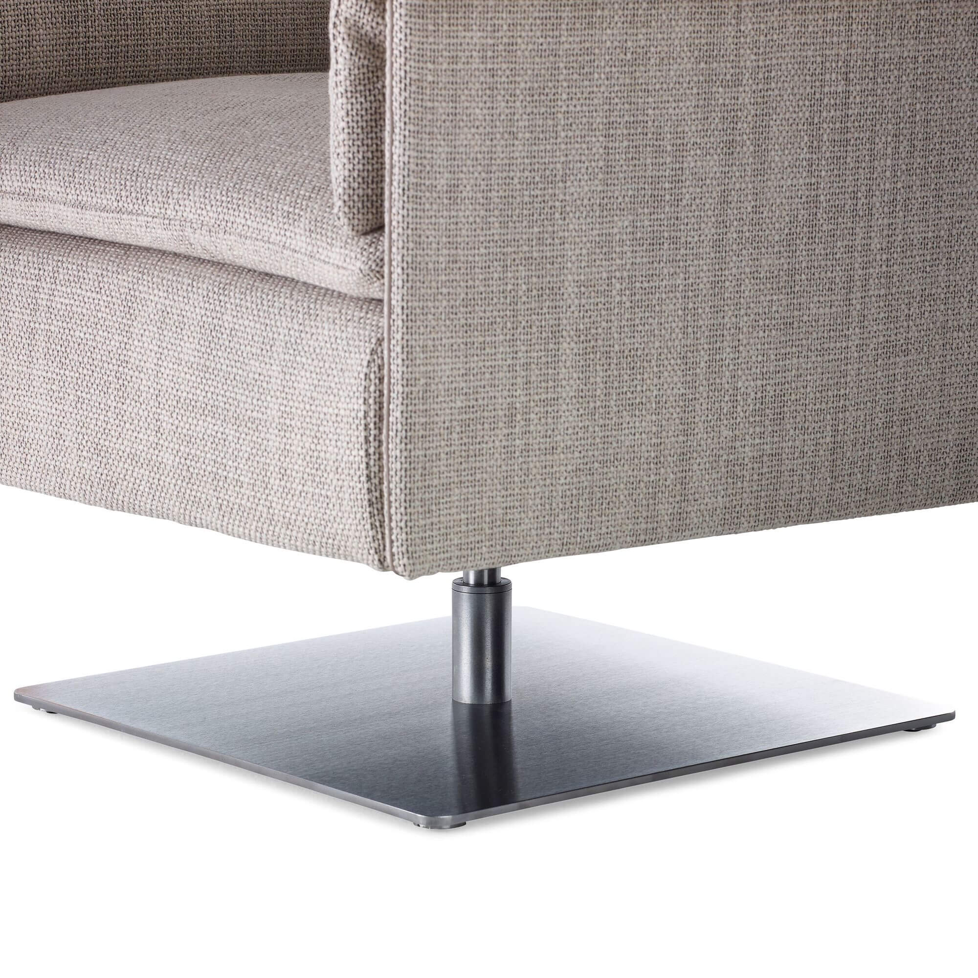 the zoomed side angle of a Mantle Club Chair with metal base and leather upholstery