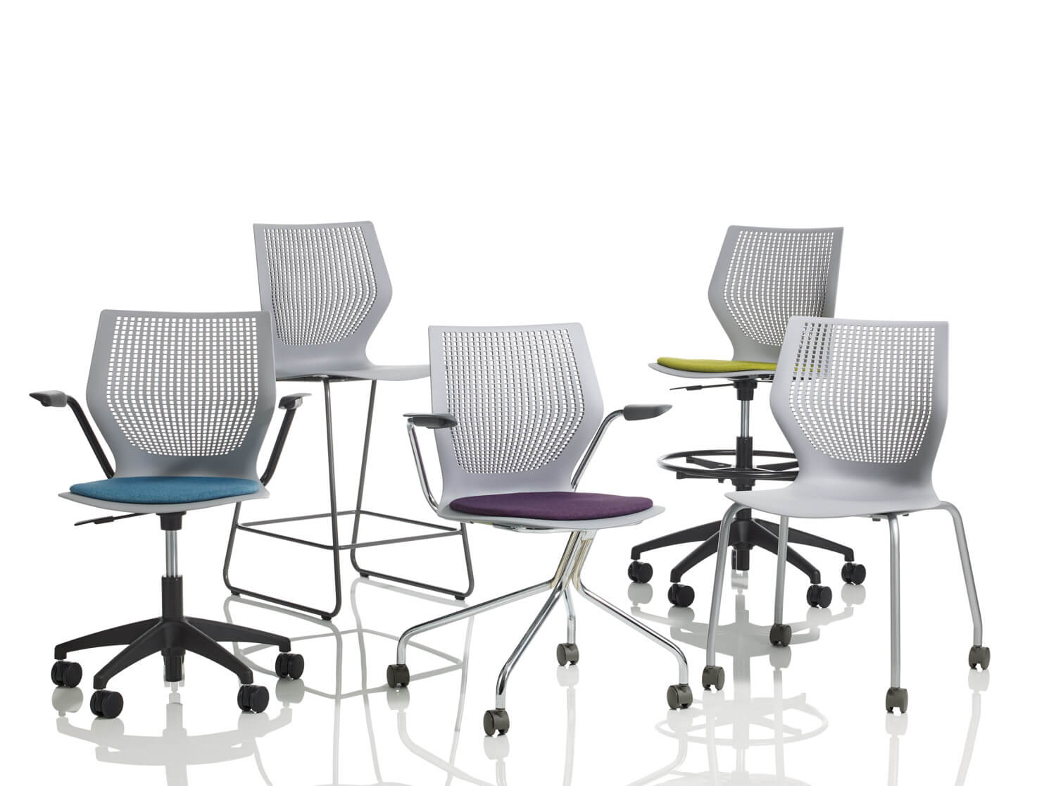 various styles of the MultiGeneration Chair model in a white room