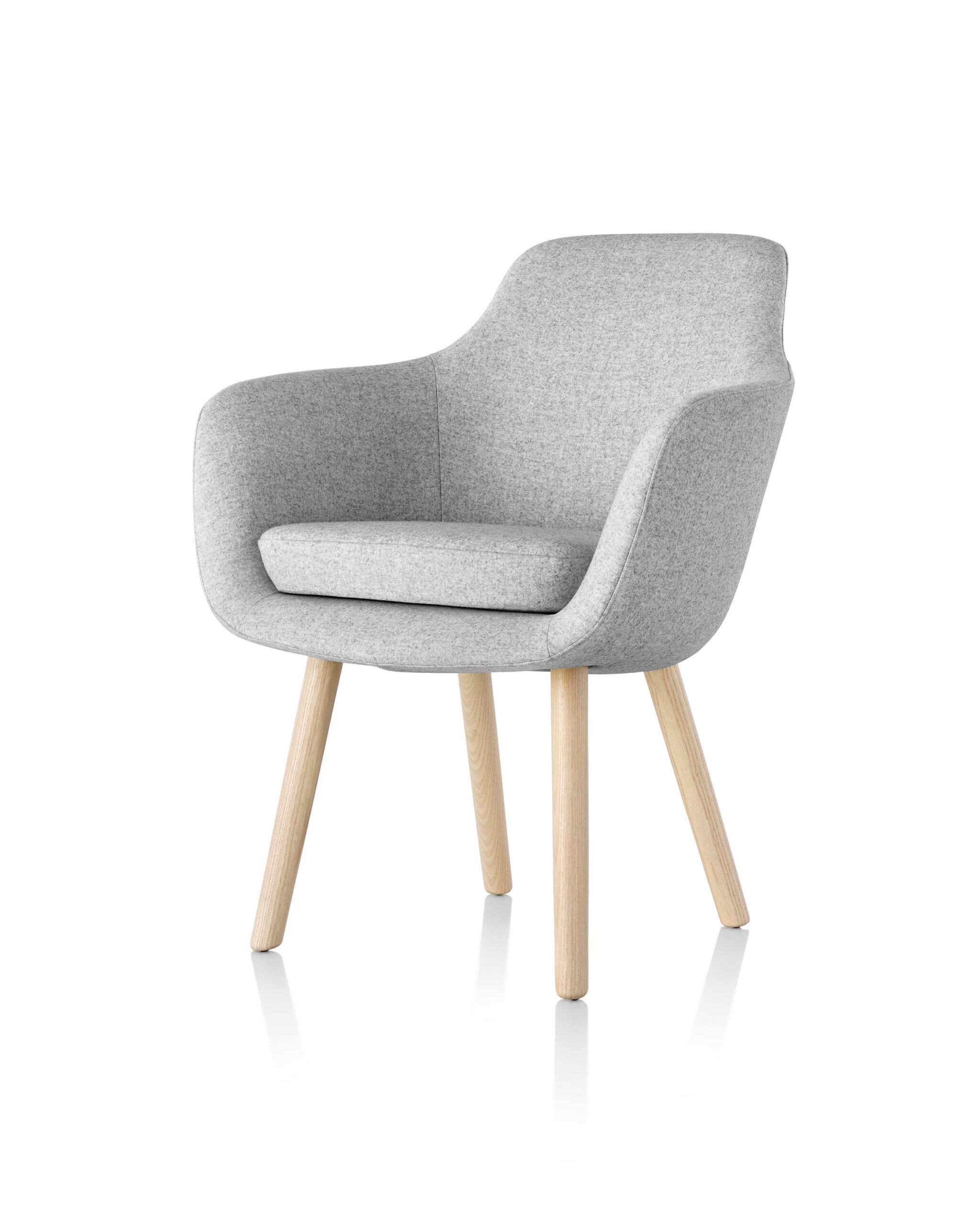 the front side angle of a Saiba Side Chair with grey marle upholstery and wooden legs in a white room