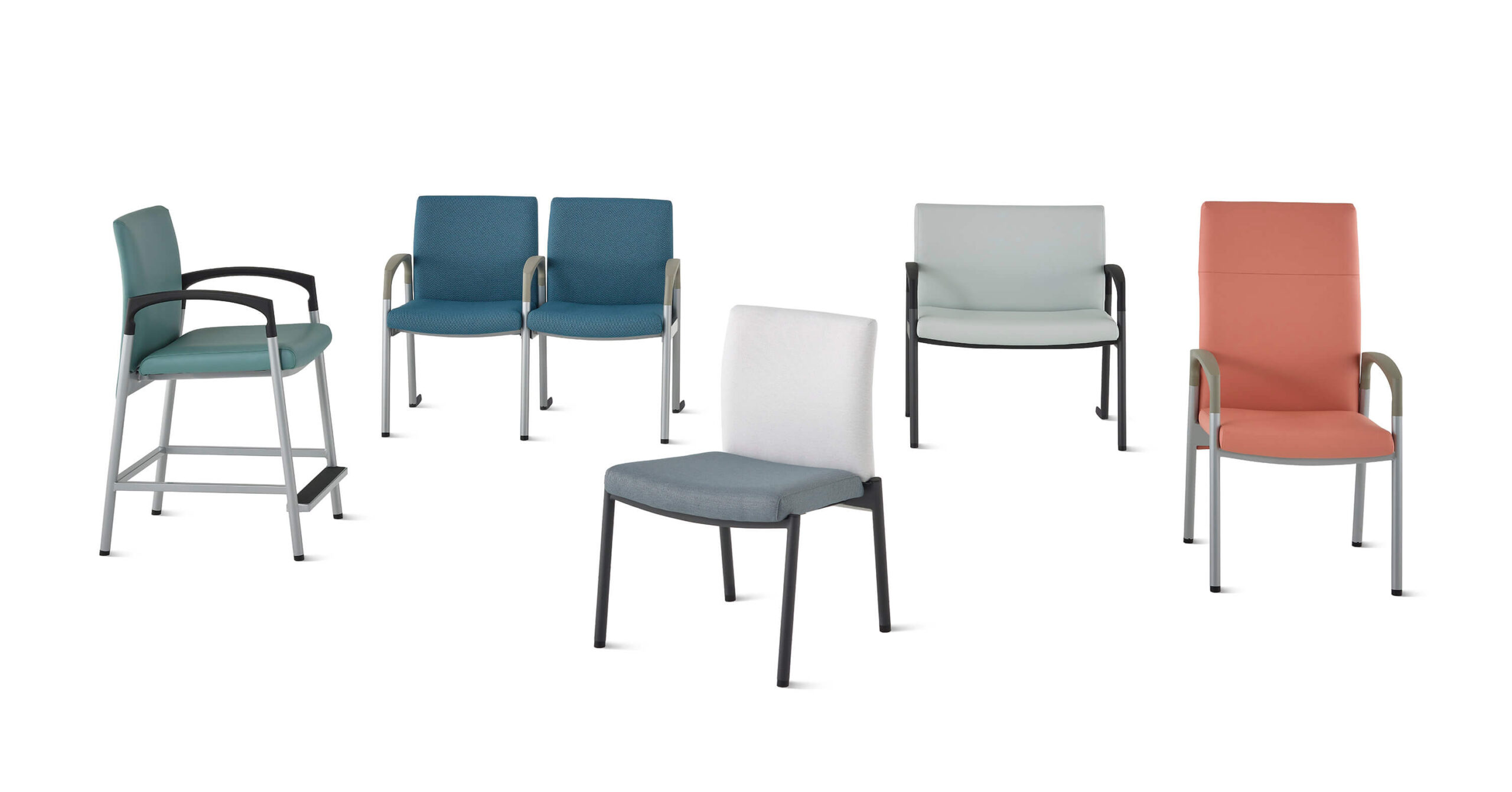 different models of a Valor Patient Chair in various colours in a white room