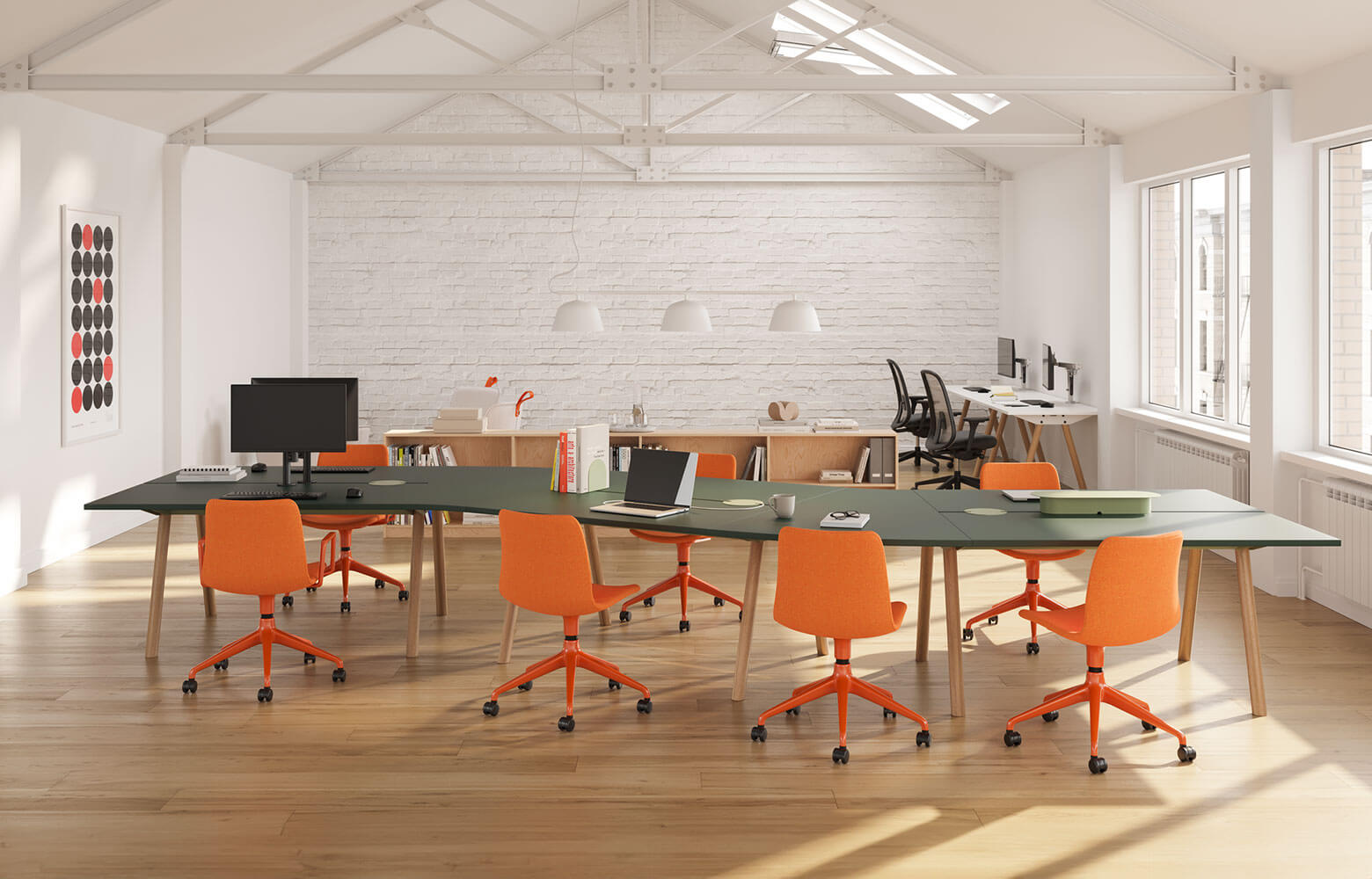 an Activity-Based Work office setting featuring a long table with yellow chairs around and two work stations on the right corner
