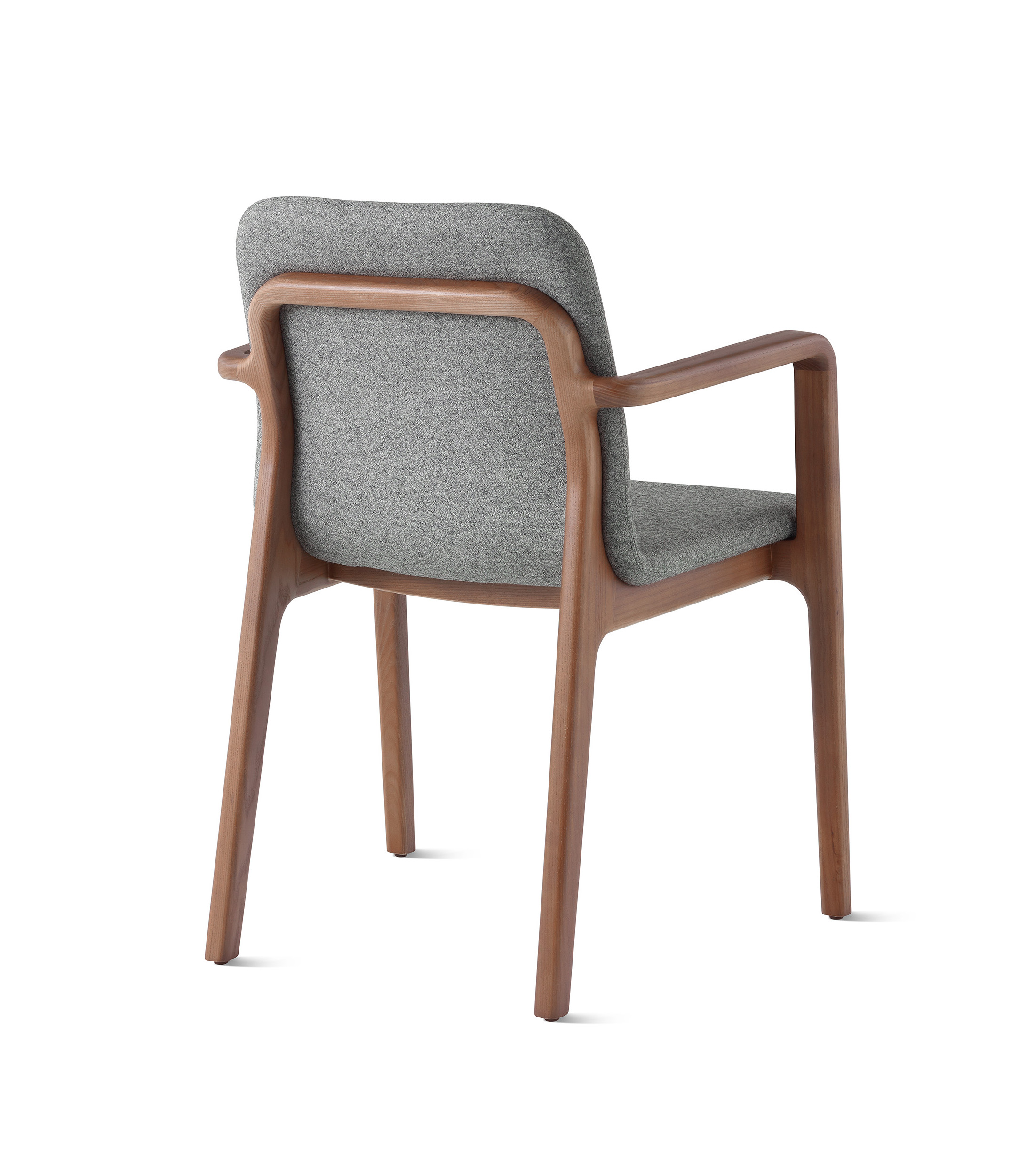 the back side angle of a Deft Side Chair with wallnut wooden frame and grey marle upholstery in a white room