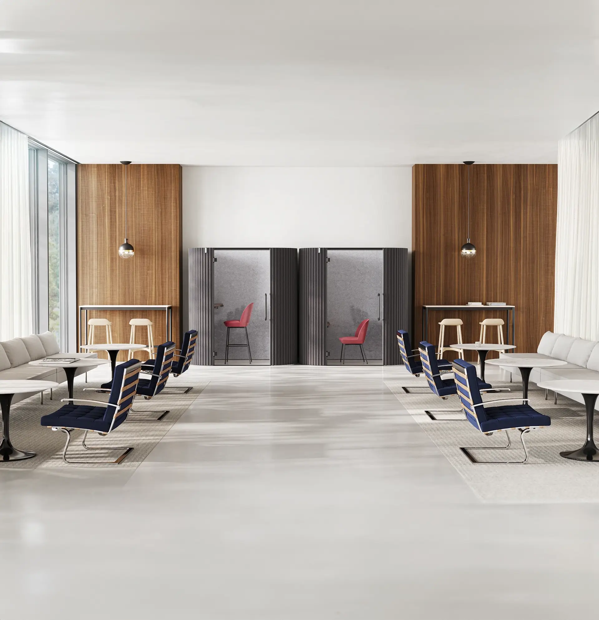 relationship-based work office design featuring sound prooh pods in the background and blue lounge chairs with side tables and sofas on the left and right side in a sydney workspace