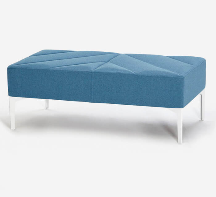 a light blue Hatch Modular Sofa Bench in a white room