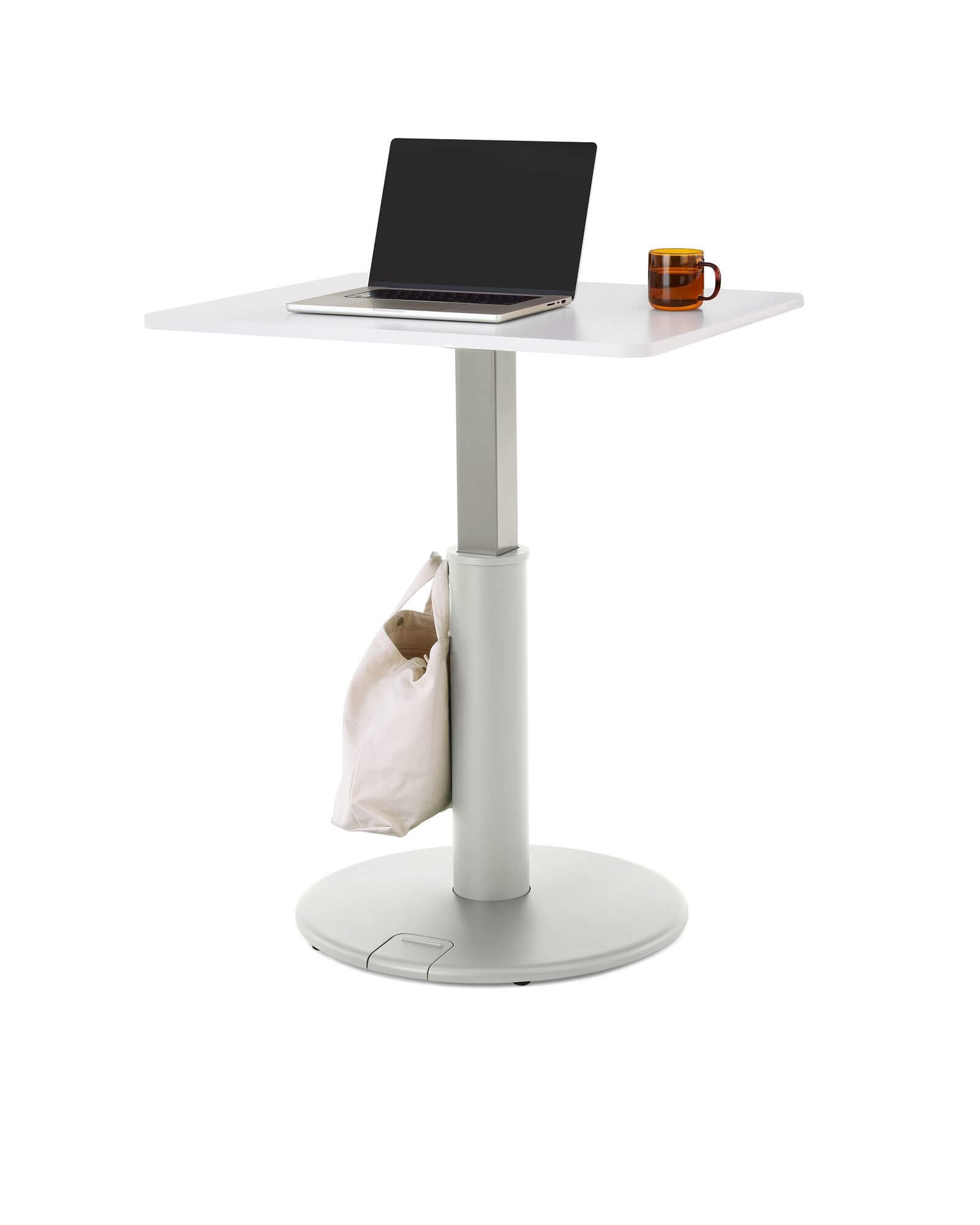 a white top oe1 sit to stand table with gray colour base in a white room