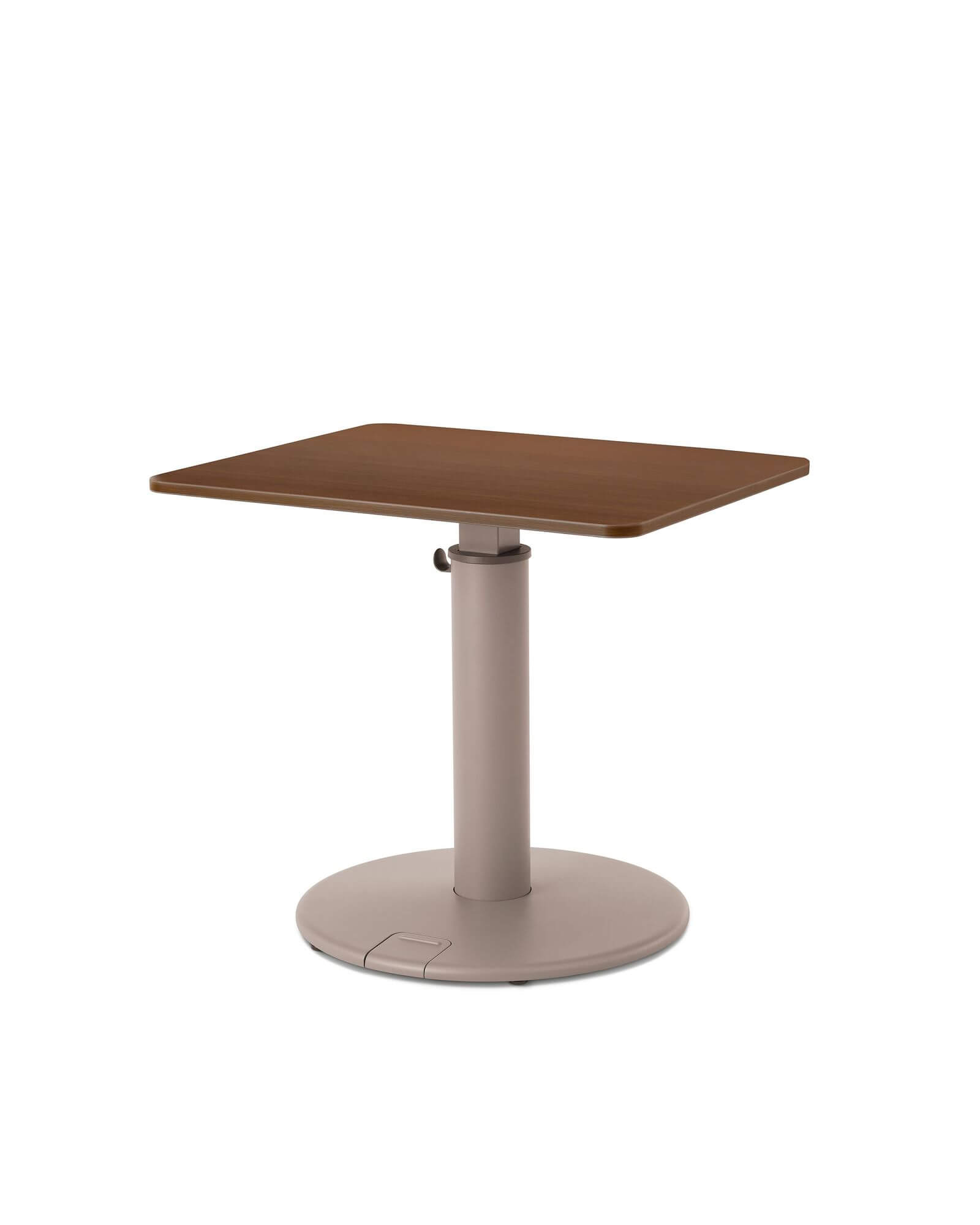 a wooden top oe1 sit to stand table with mint colour base in a white room