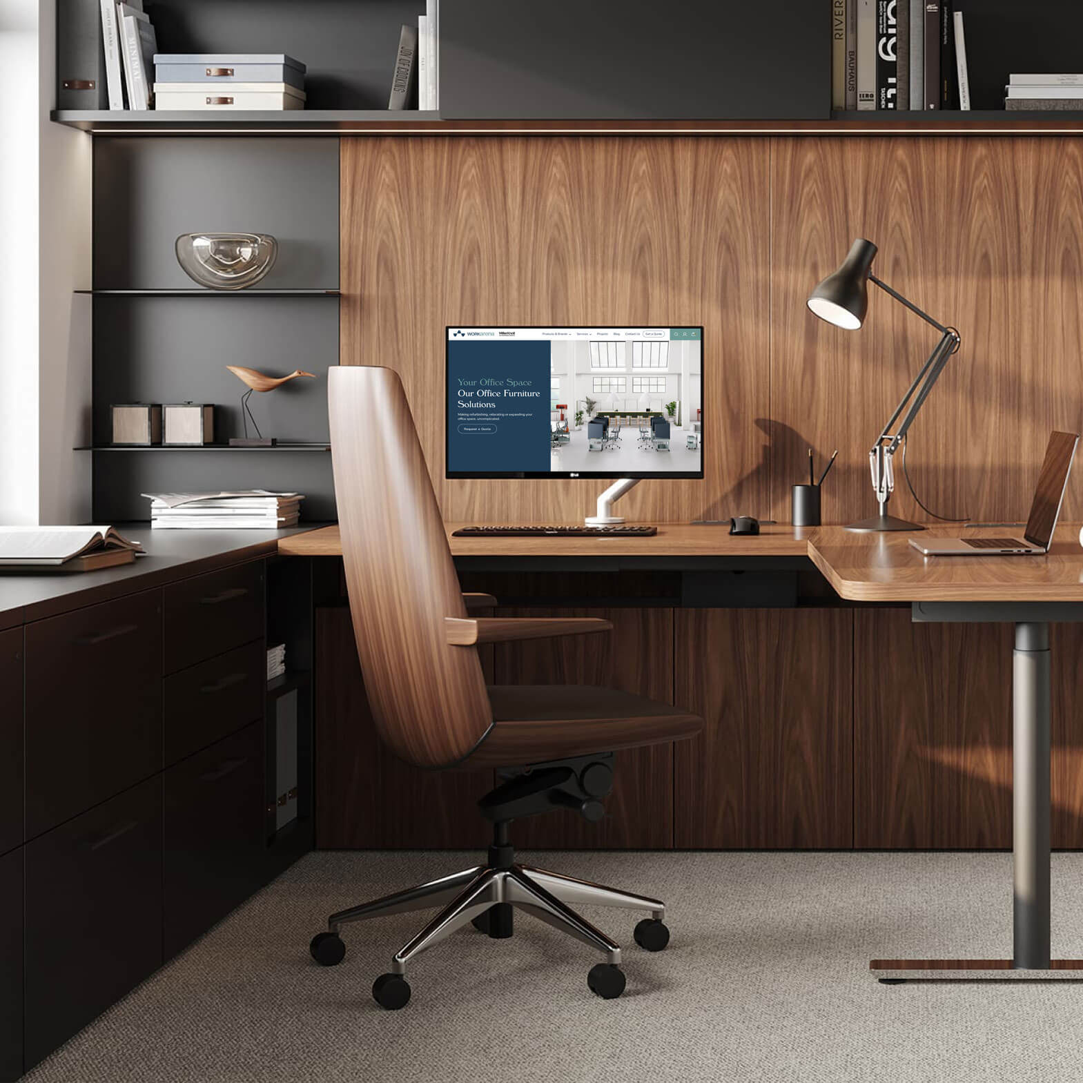 an elegant office featuring a clamshell chair designed by Craig Bassam with wodden furniture around and a monitor on top of the desk.