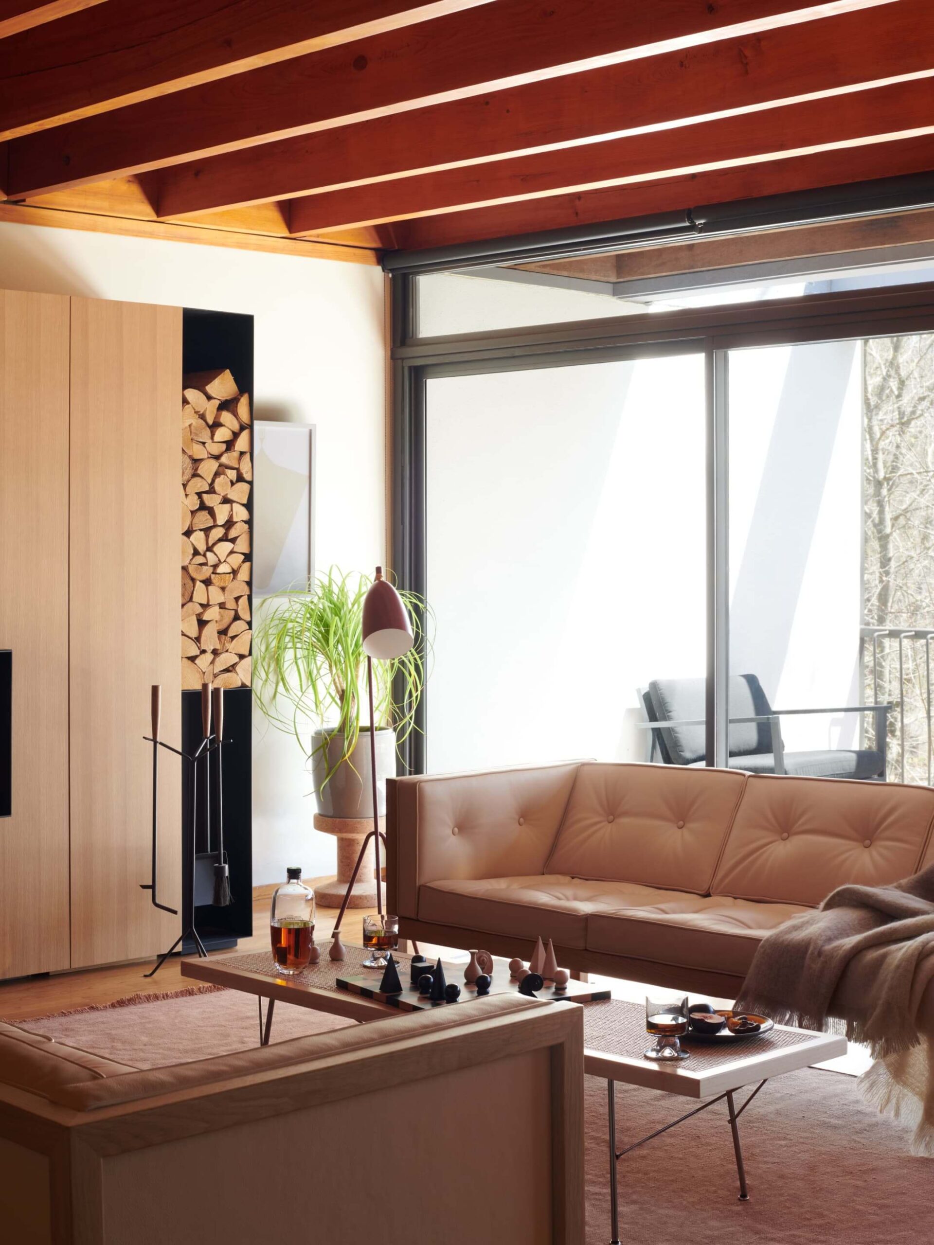 a modern living room featuring mid-century furniture and a Nelson Cube Wooden Frame Sofa