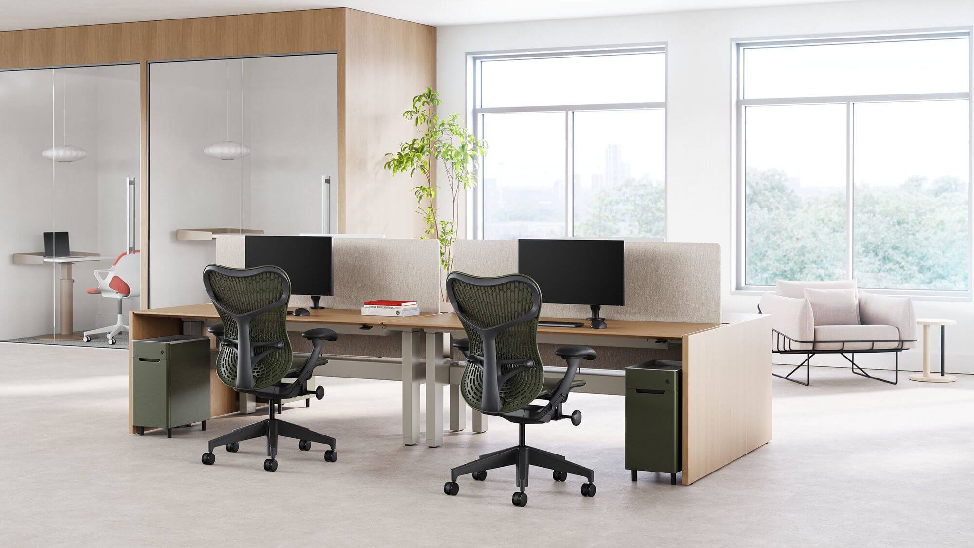 a modern office setting featring two workstations and two Ambit Desk Pedestals and a big window behind