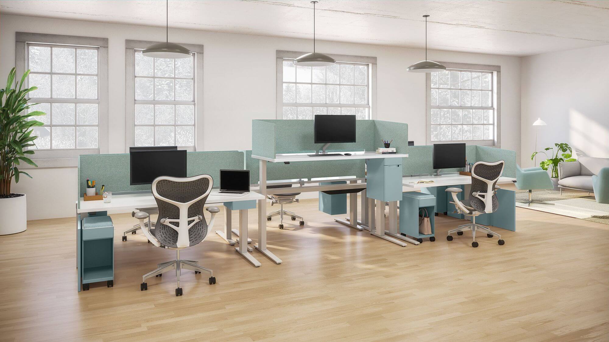 three modern workstations setting featuring an Ambit workstation Divider in light grey colour with a storage cabinets and ergonomic chairs