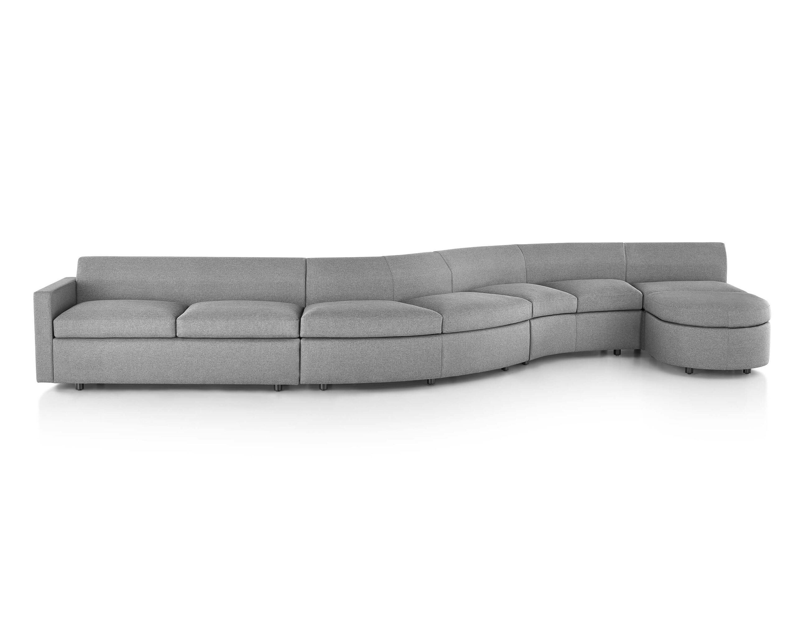 the front side angle of a gray S shapped Bevel Modular Sofa Group in a white room