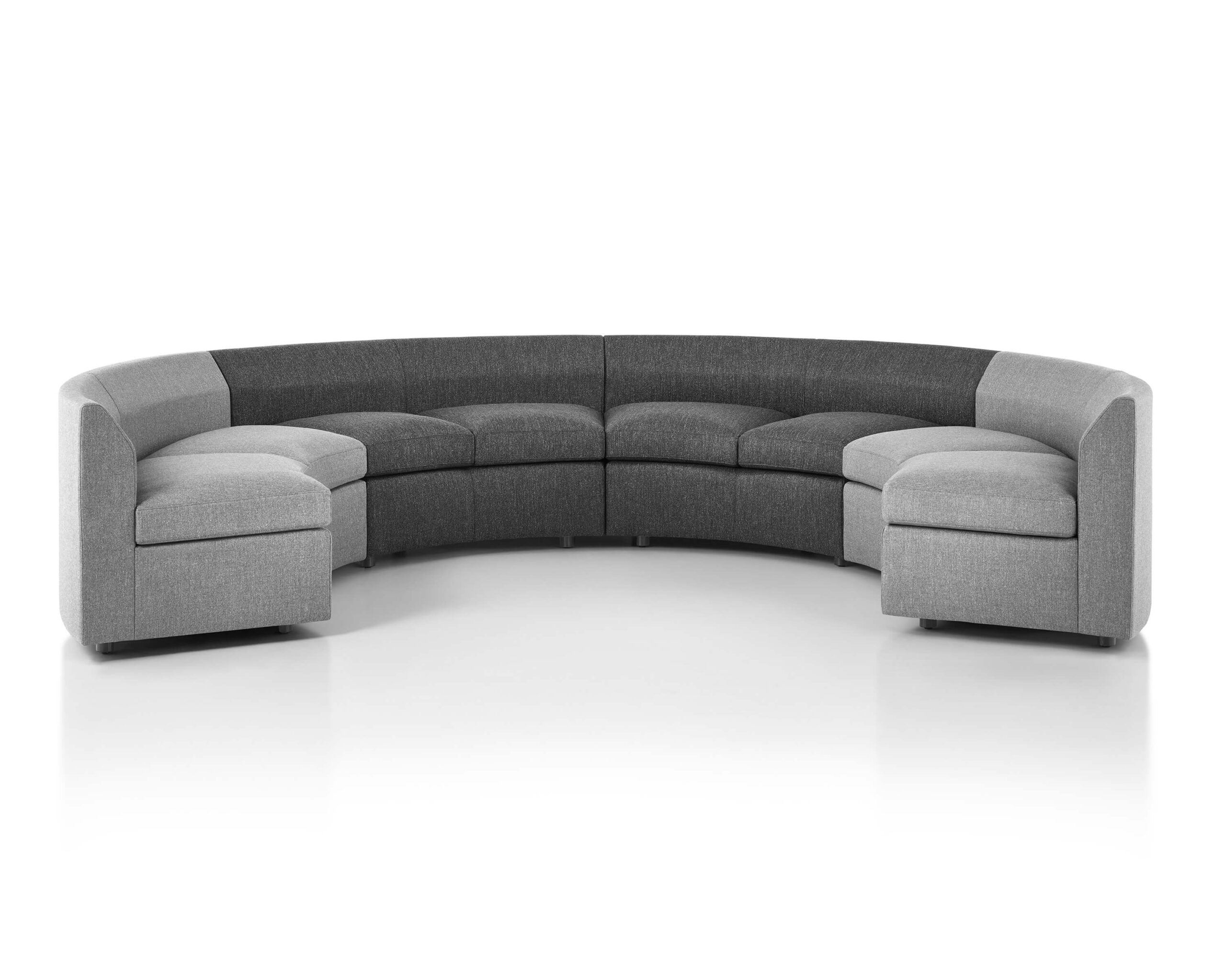 the front angle of a gray U shapped Bevel Modular Sofa Group in a white room