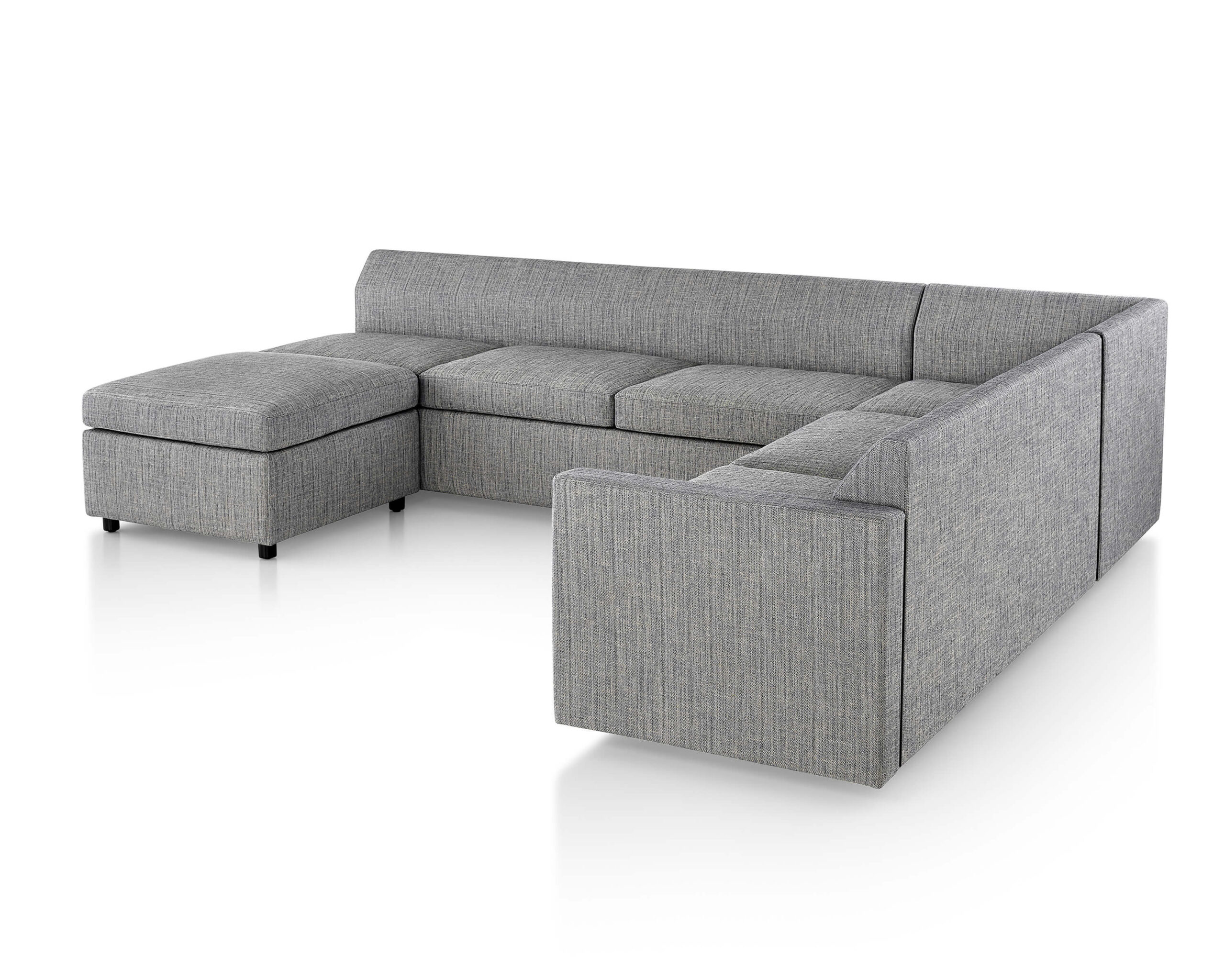 a gray L shapped Bevel Modular Sofa Group in a white room