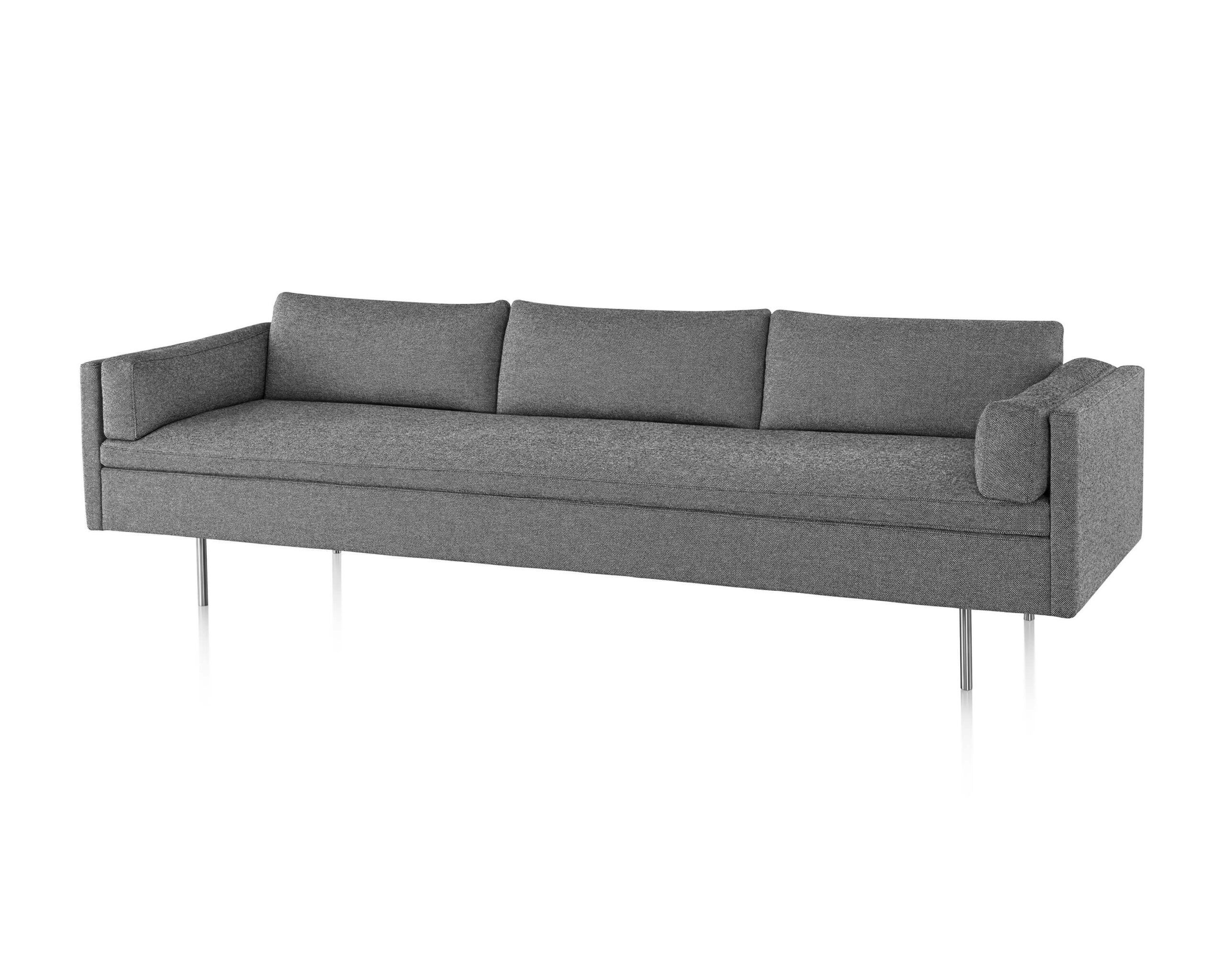 the front side angle of a three seater grey Bolster Sofa Group in a white room