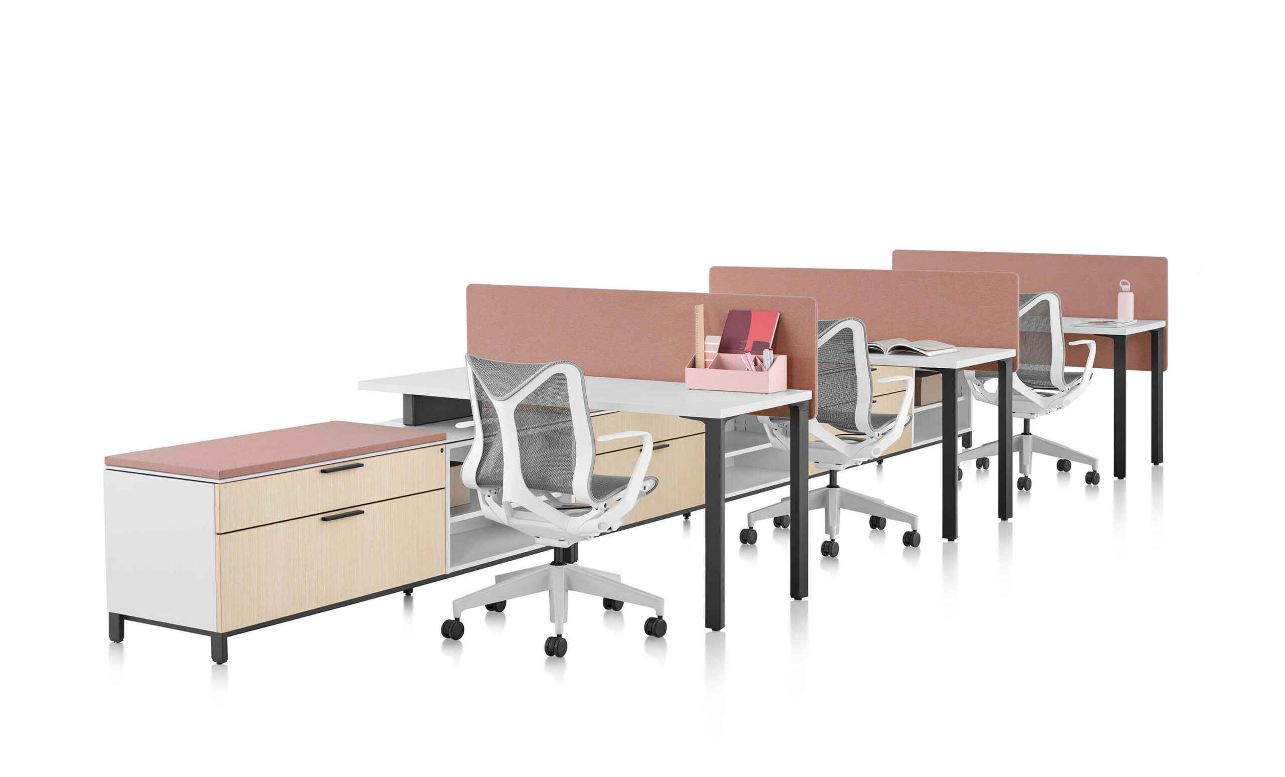 three workstations and three Canvas Workspace Storage pedestals in a white room