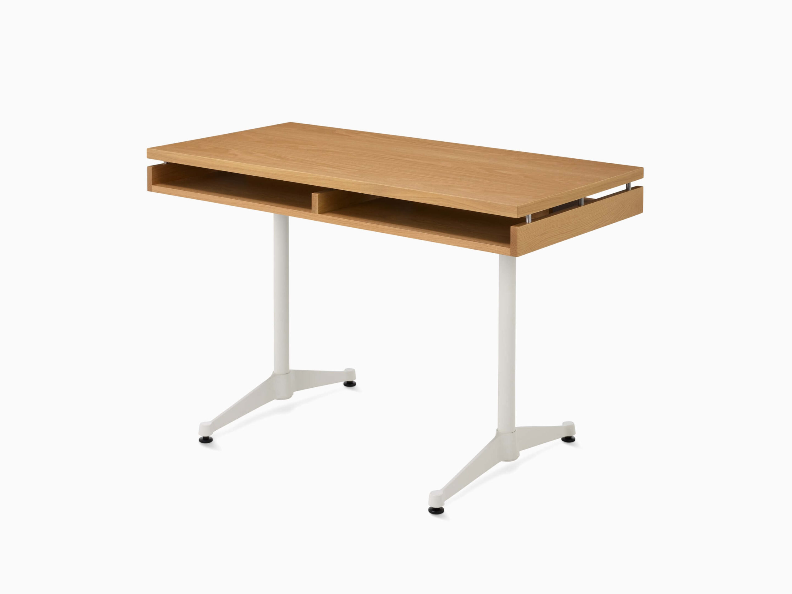 the front side angle of an Eames 2500 Series Executive Wooden Desk with white legs in a white room