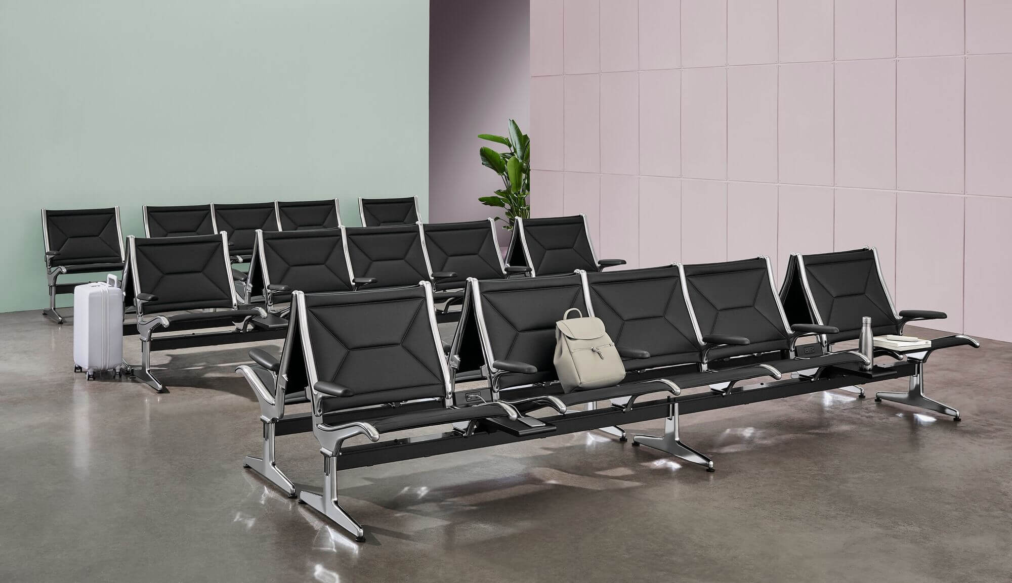 a modern and elegant reception with a set of Eames Tandem Sling Lobby Seating