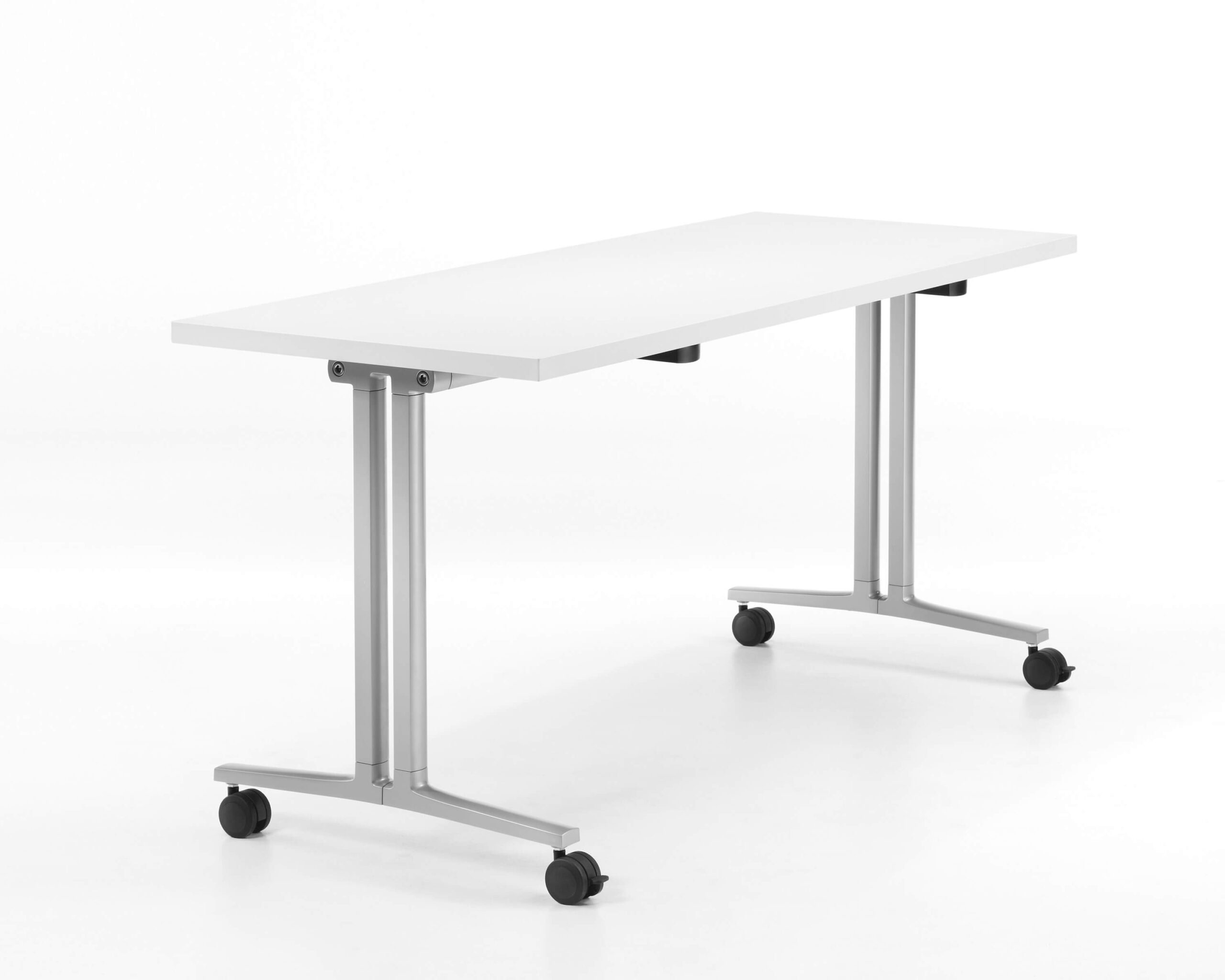 the side angle a single white top Everywhere Multi-Purpose Tables in a white room