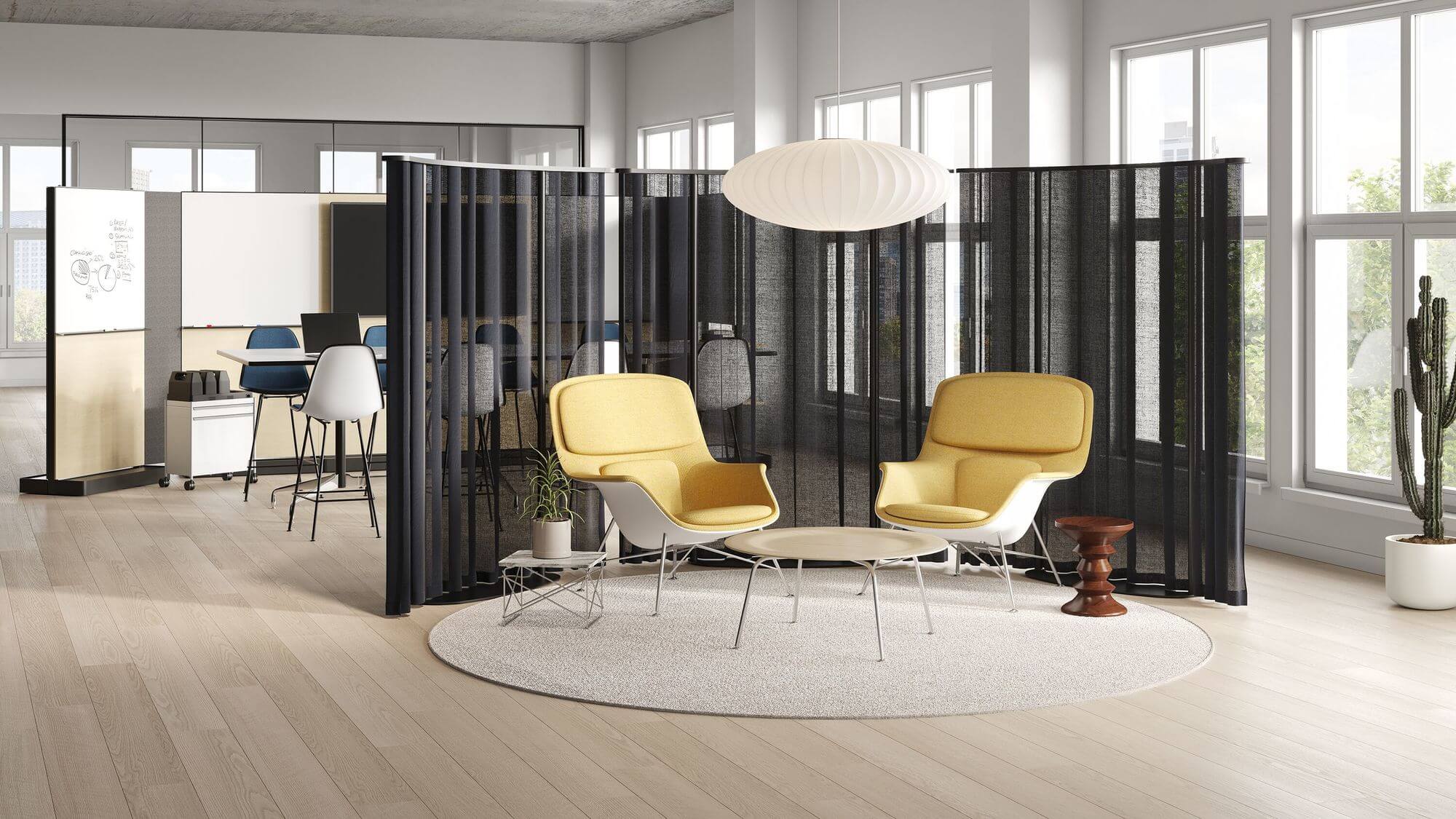 a modern shared area at an office featuring two yellow Striad Lounge Chair with high back and a wooden coffee table in the middle