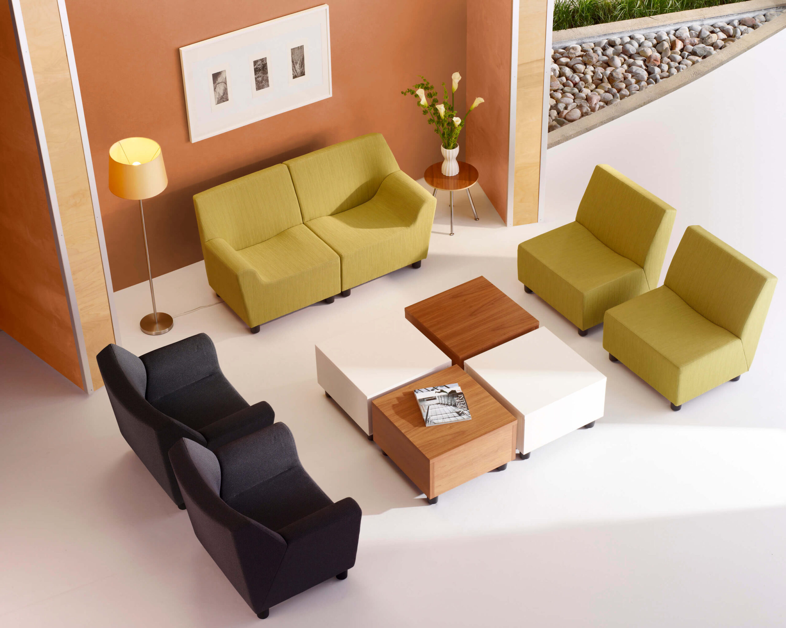 the top view of a Swoop Modular Lounge Sofa setting with a squared middle table and a lamp in the left side