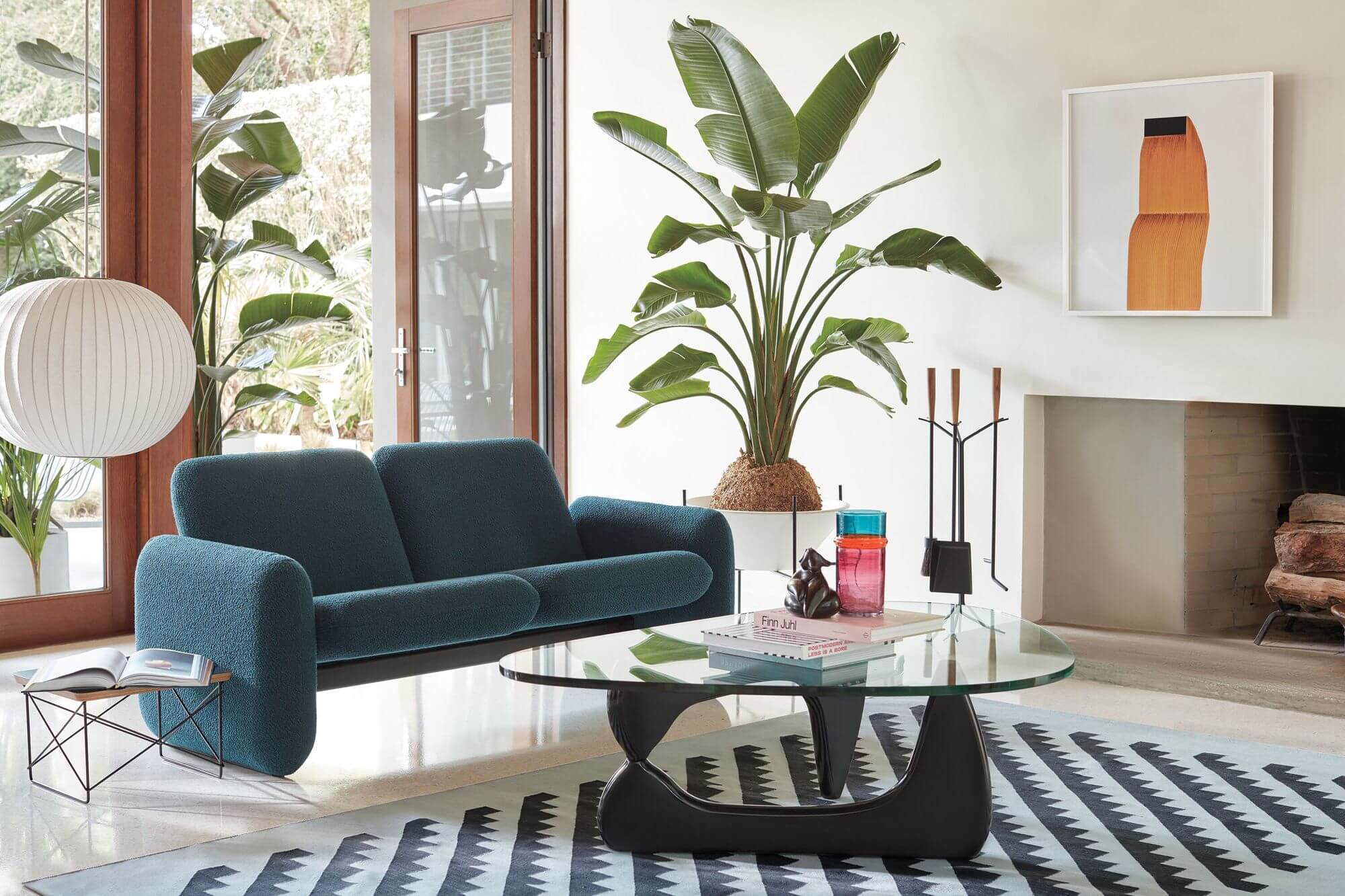 a modern and stylish livibng room with a two seater green Wilkes Modular Sofa Group