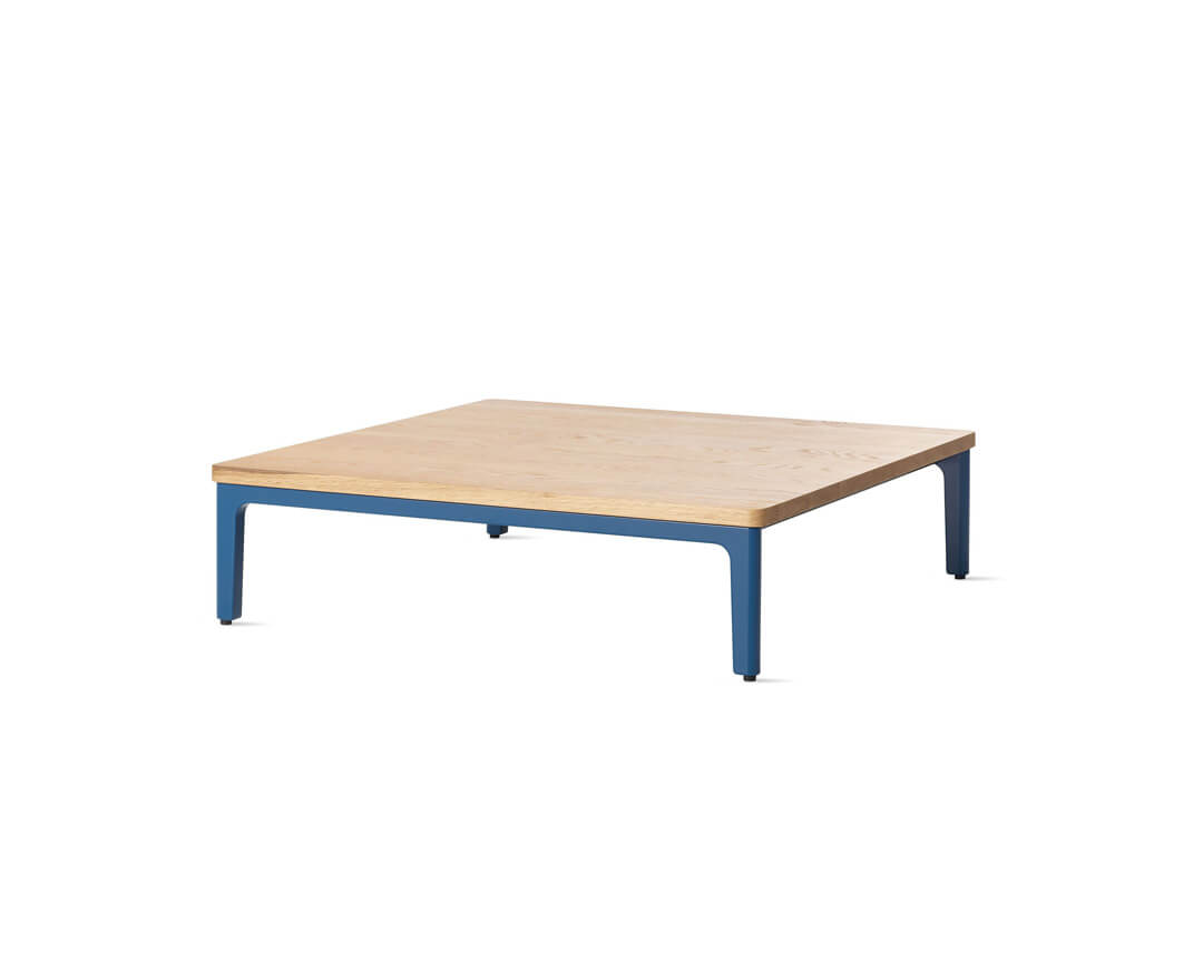 the side angle of a mimo side coffee table naughtone with natural wood top in a white room