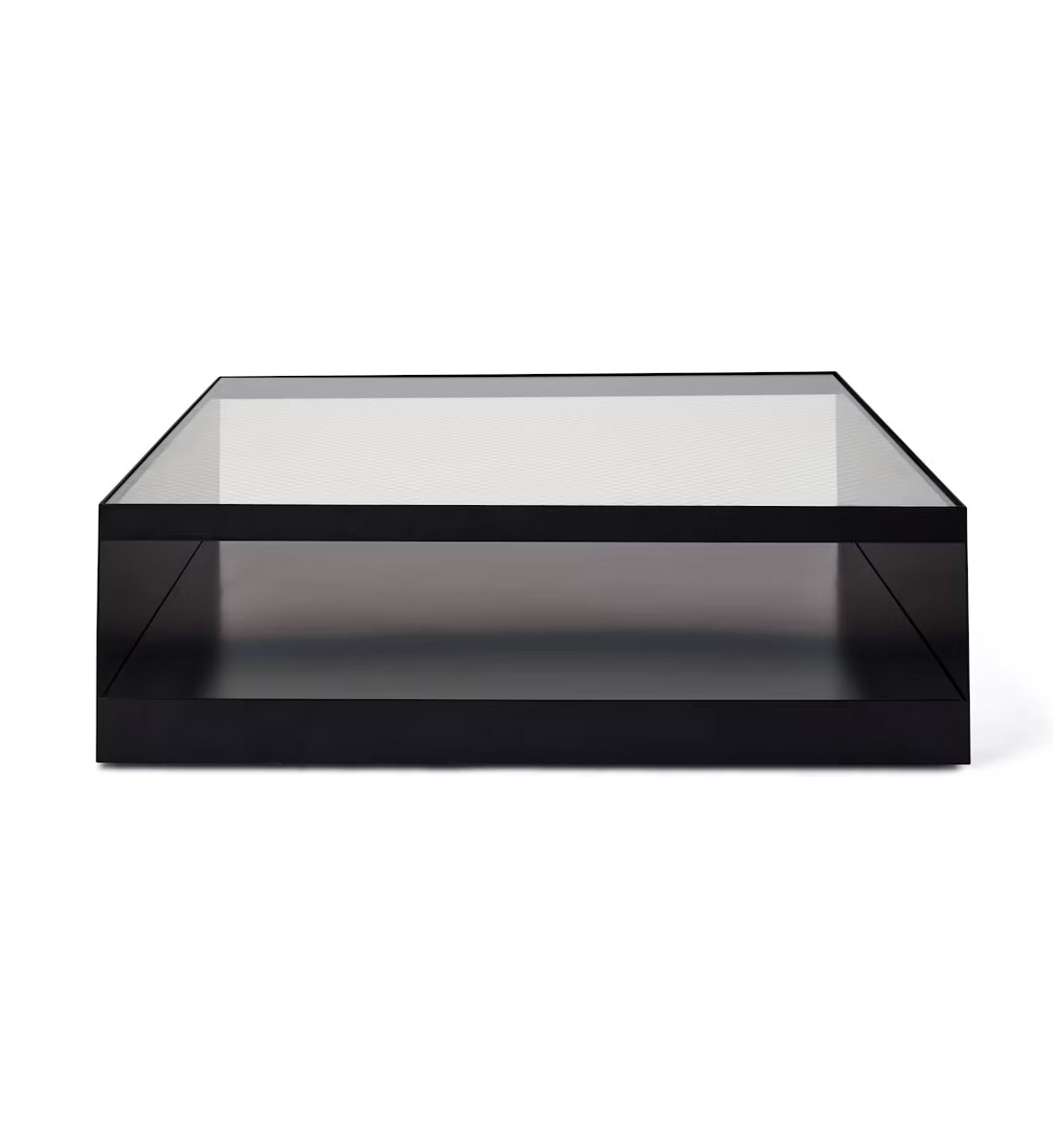 the front of a black D Urso Occasional Table by knoll in a white room