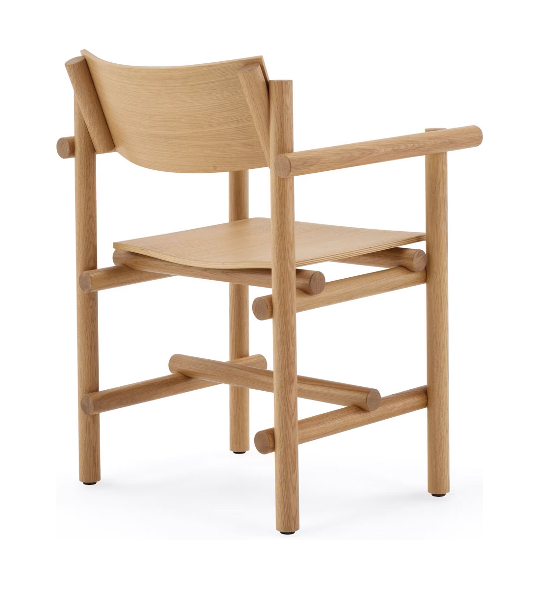 the back side angle of a wooden Muecke Armchair by knoll in a whte room