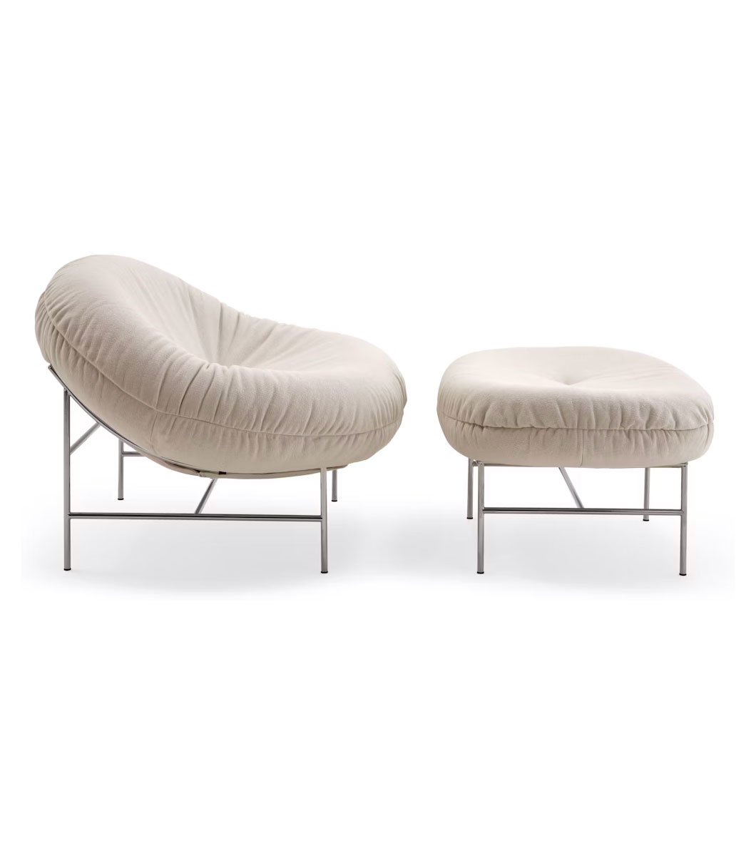the right side of a Perron Bun Lounge Chair and Ottoman knoll in a white room
