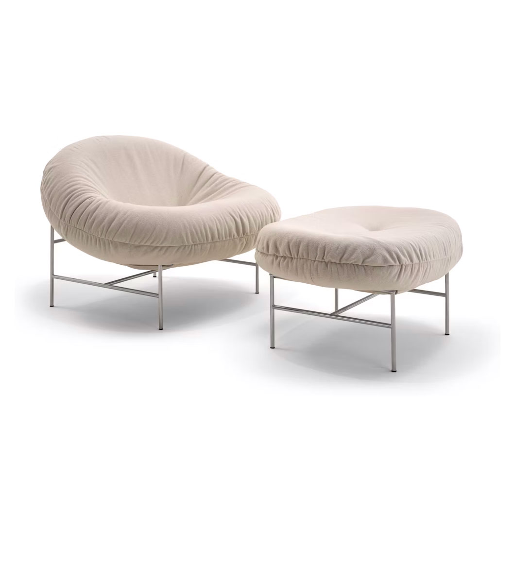 a white Perron Bun Lounge Chair and Ottoman knoll in a white room