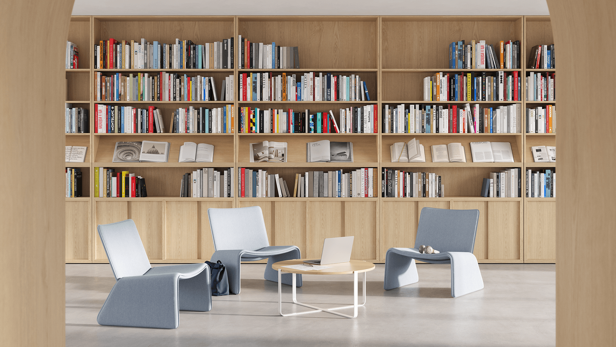 three Fin Lounge Chairs in a library with a bookshelf in the background