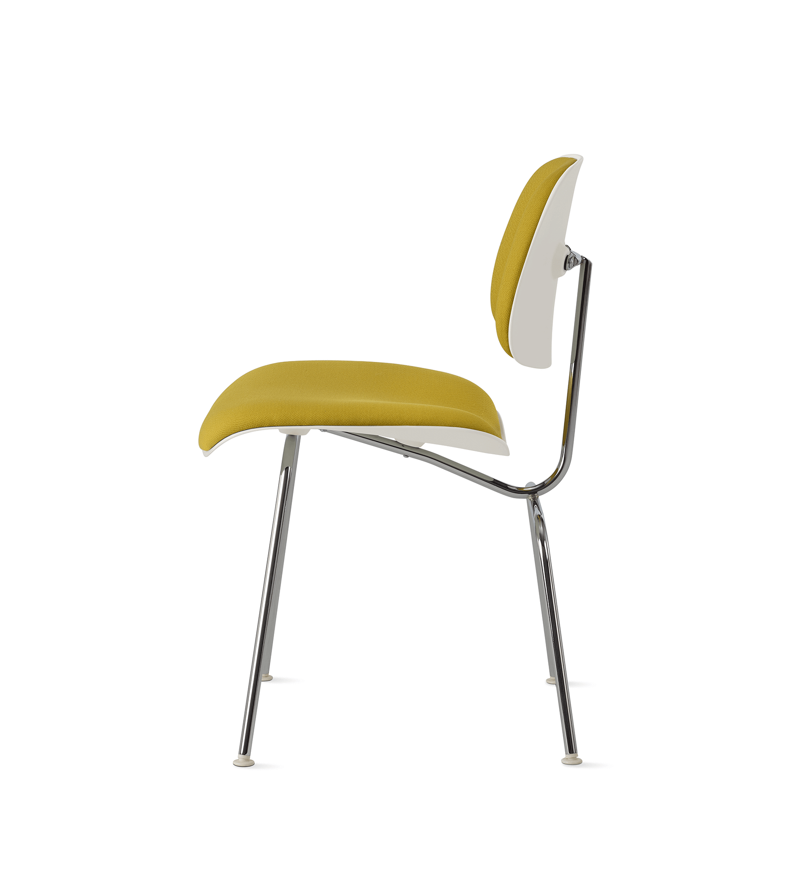 left side of a eames molded plastic dining chair in orange colour in a white room
