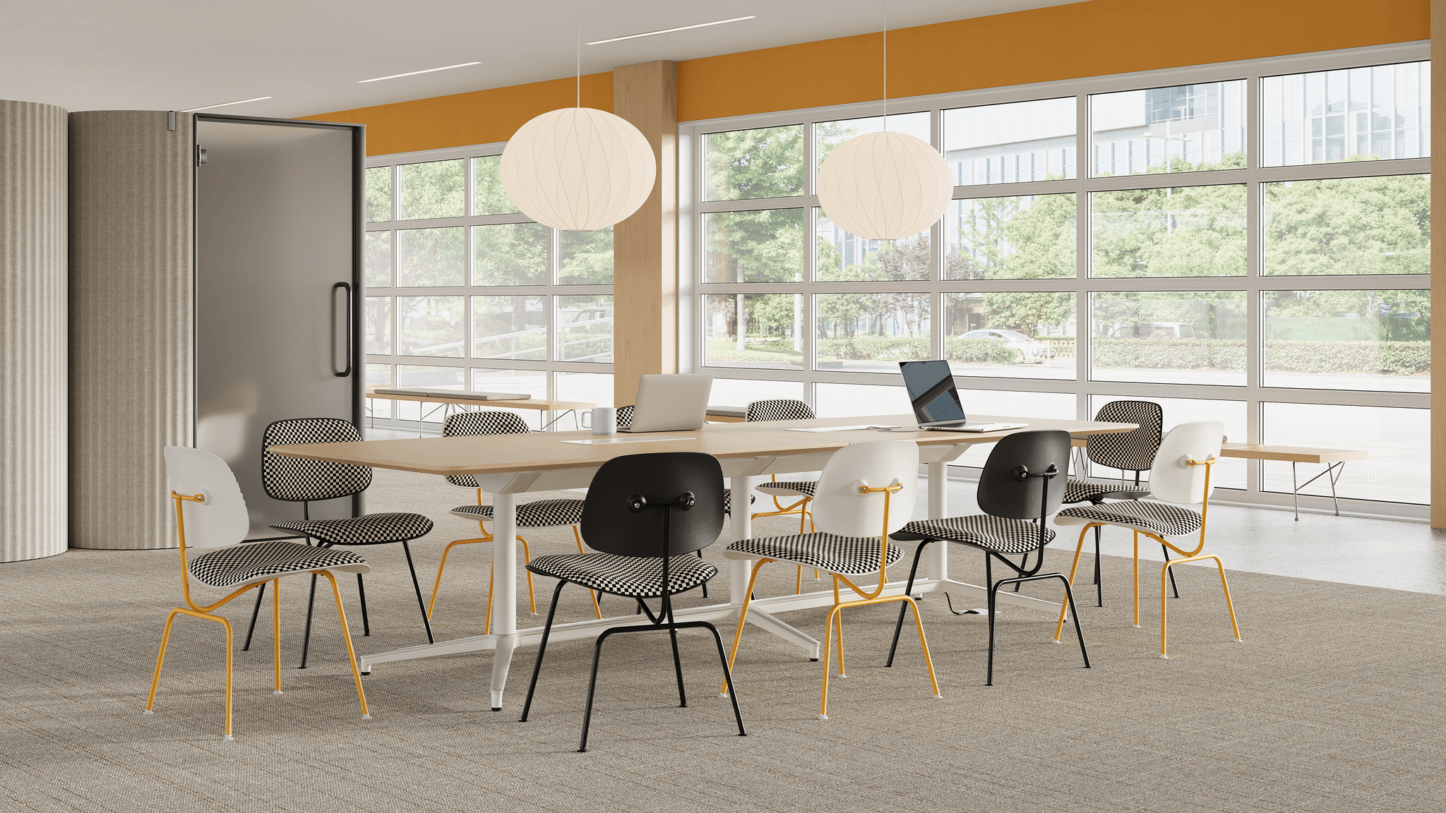 a long wooden table and eames molded plastic dining chair in yellow frame and chessboard style upholstery in a meeting room