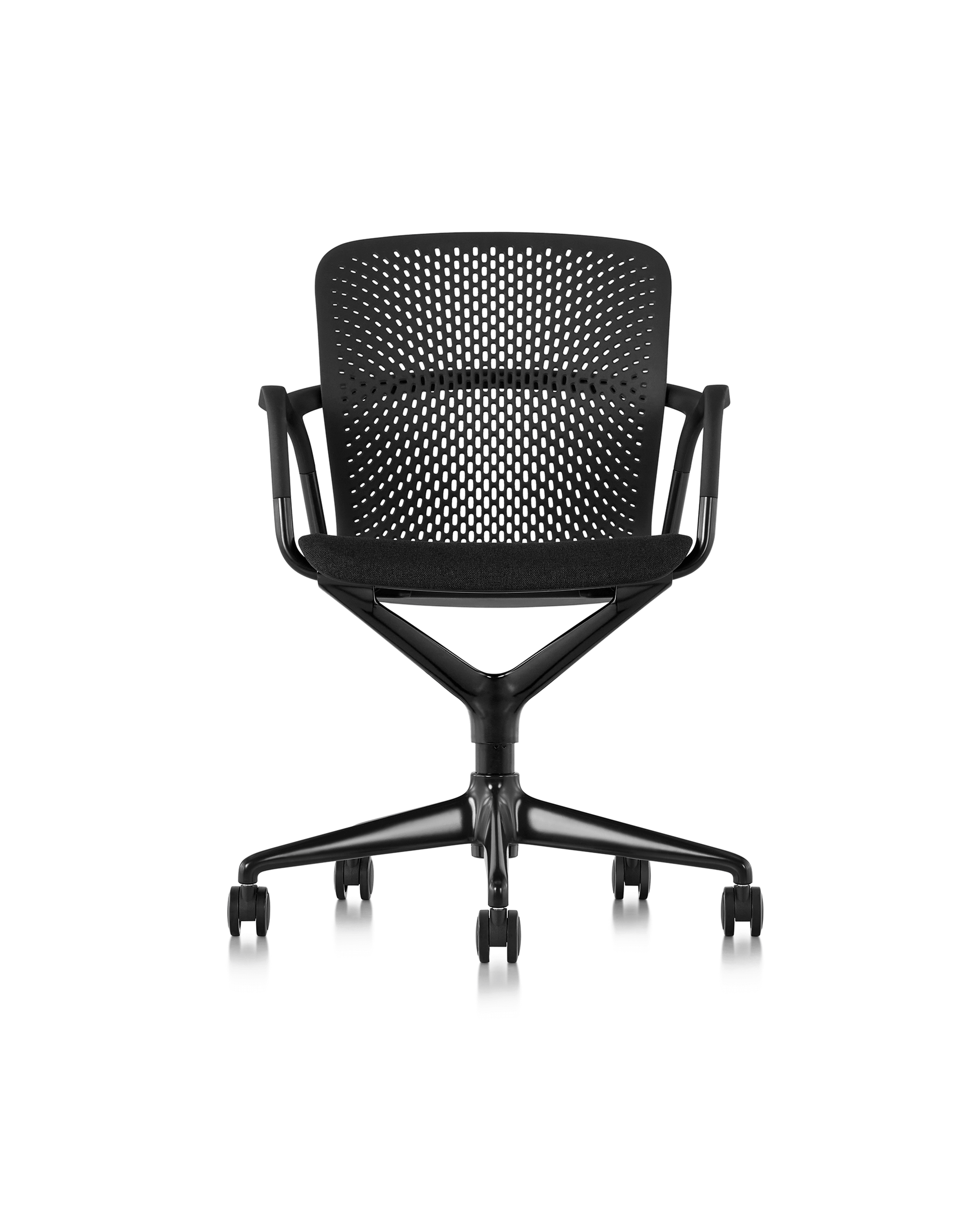 the front side of a black keyn chair with castor wheels in a white room